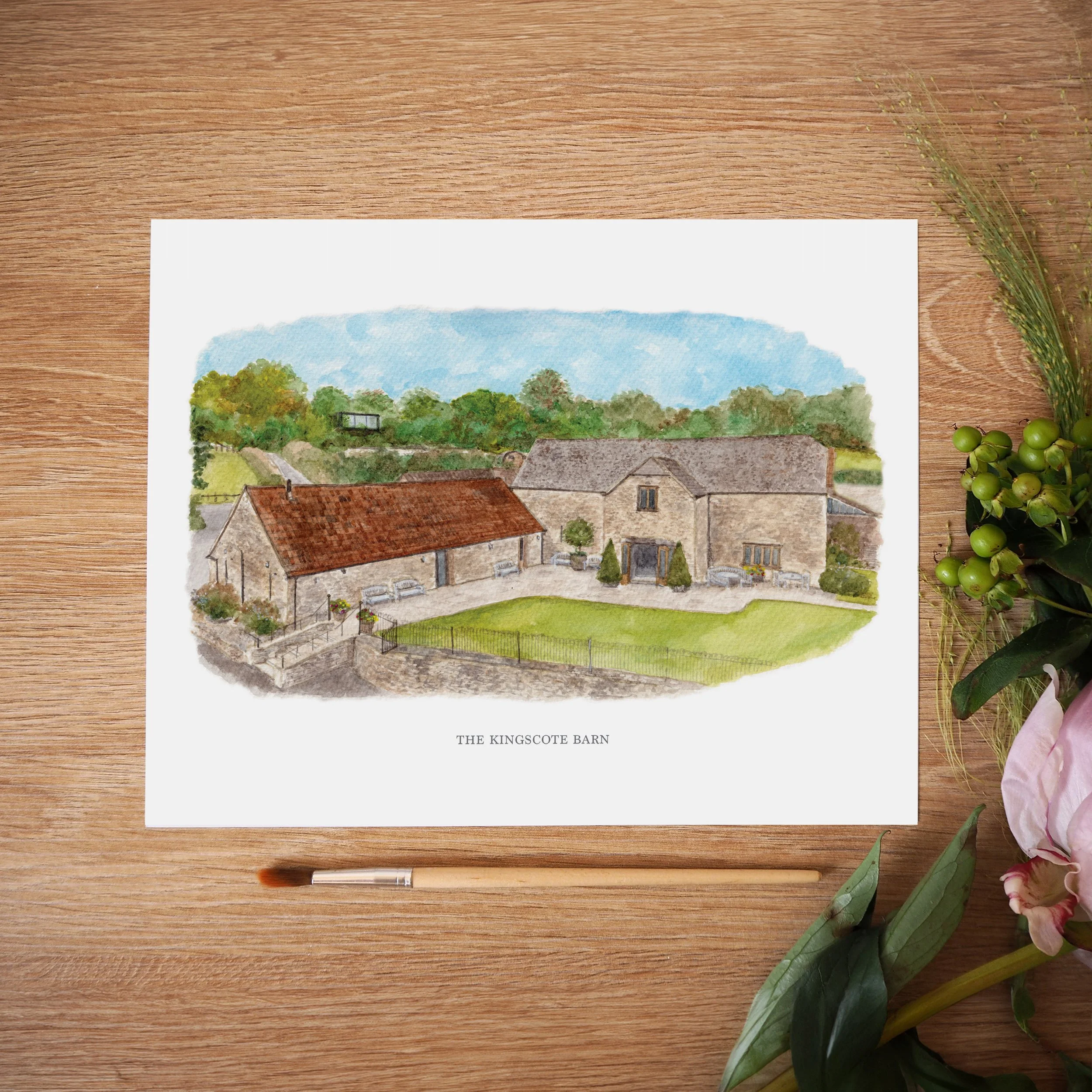 An unframed personalised print of a watercolour illustration of wedding venue The Kingscote Barn