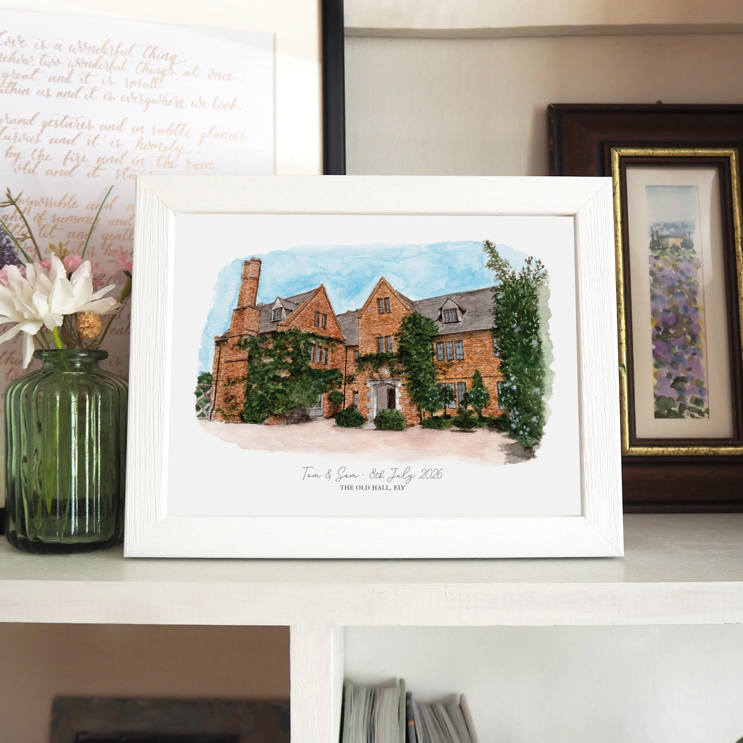 A framed, personalised print of a watercolour illustration of wedding venue The Old Hall, Ely