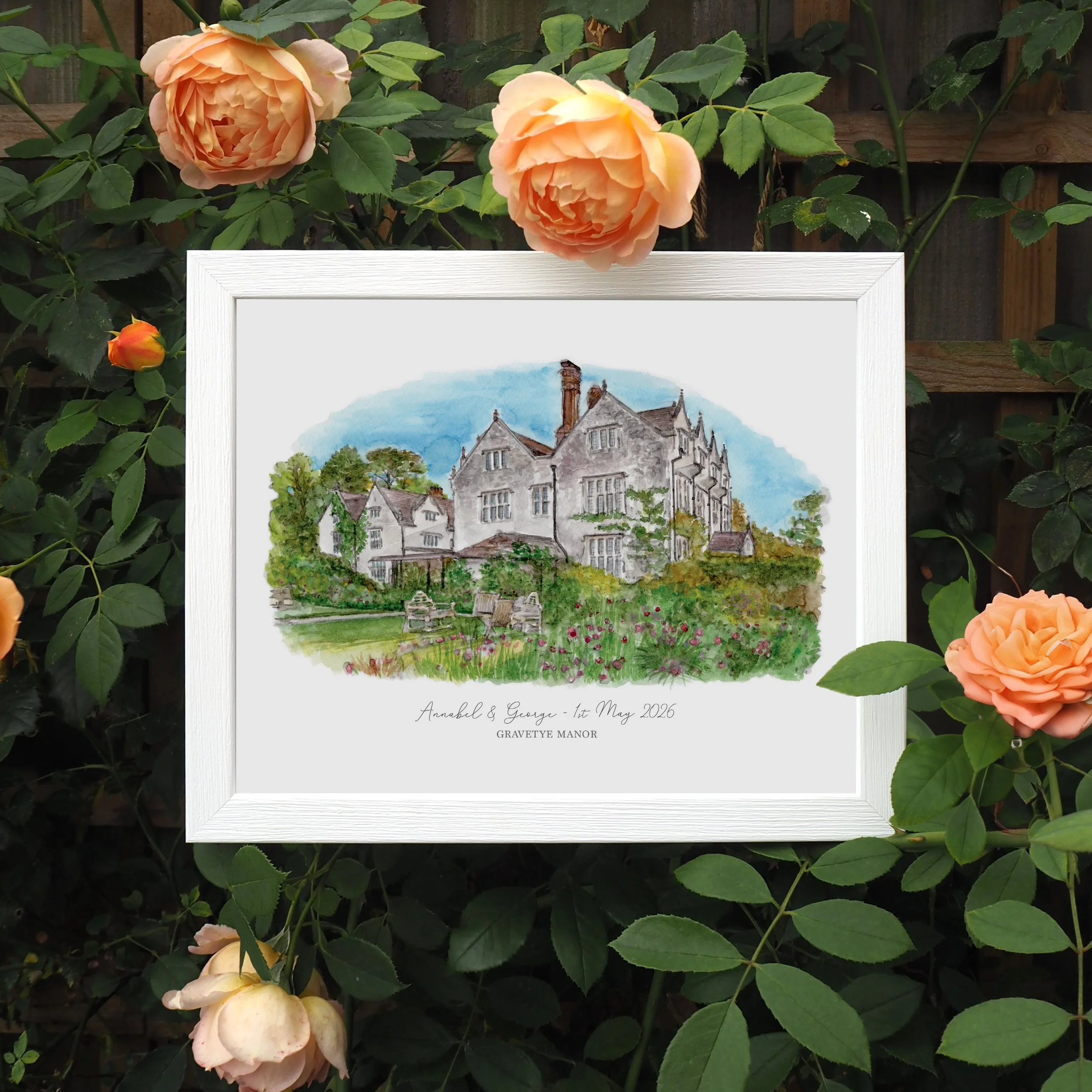 A framed personalised print of a watercolour illustration of wedding venue Gravetye Manor