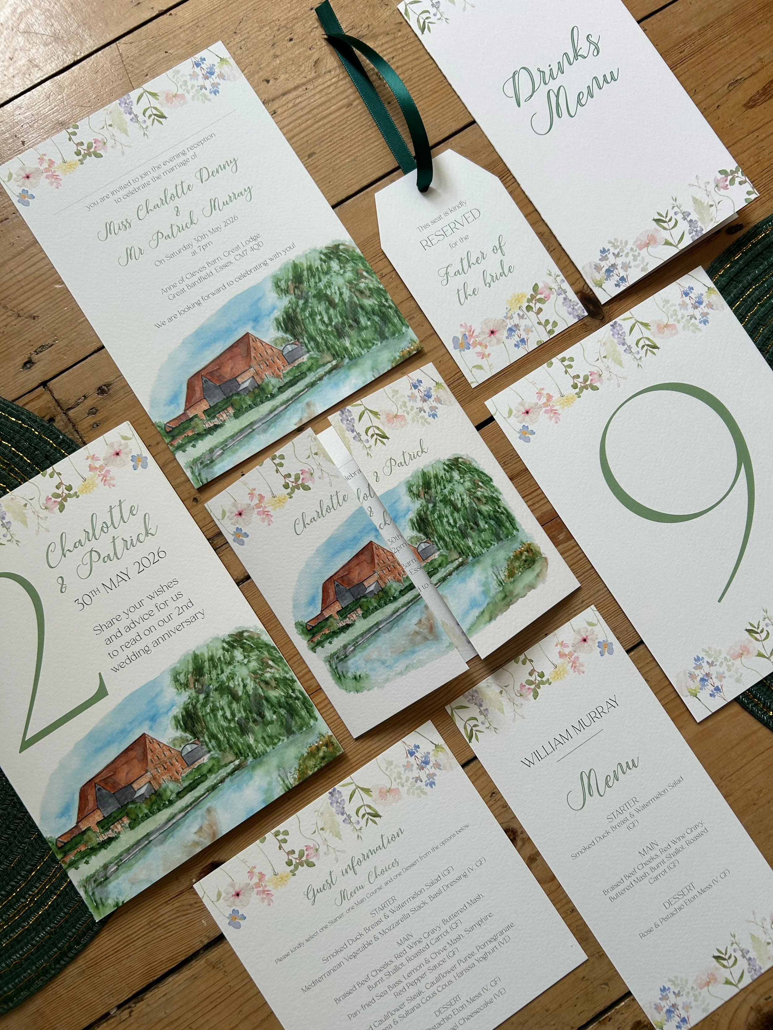 A bespoke stationery suite including invitations, information card, menu, table numbers, drinks menu, seat reservation tags and greetings card