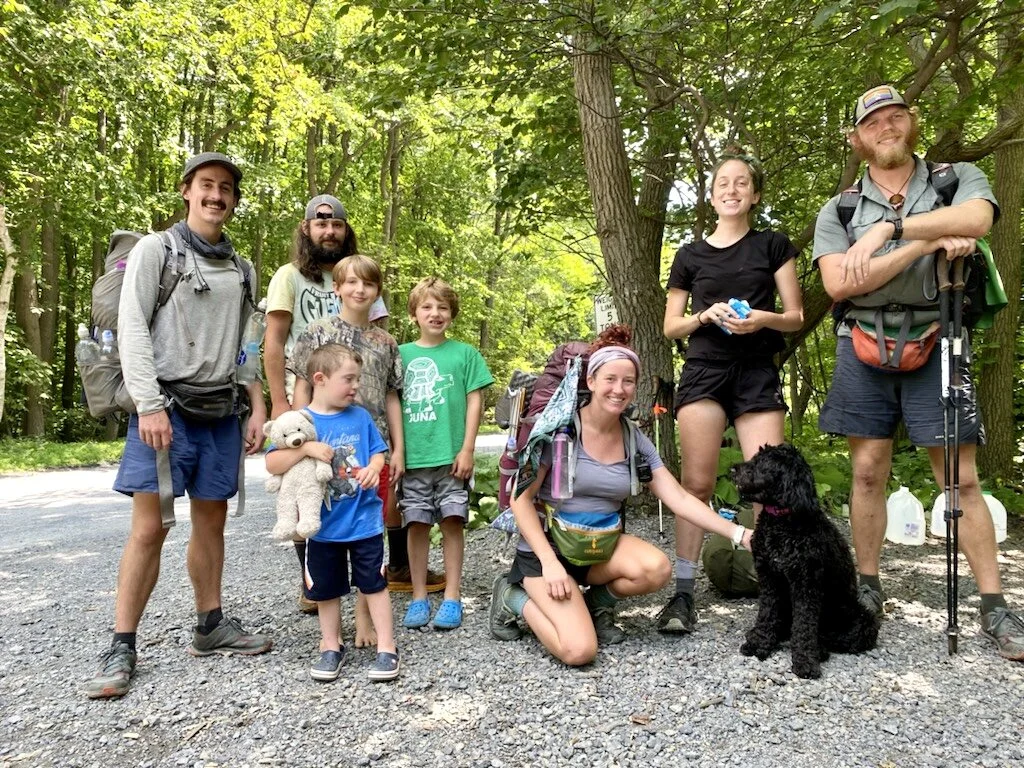7/23, Stephen, Andrew, Nicky, and Maggie 🐕  Webber-Plank showering Stache, Gushers, Sparks, and Bear legs with trail magic ✨.