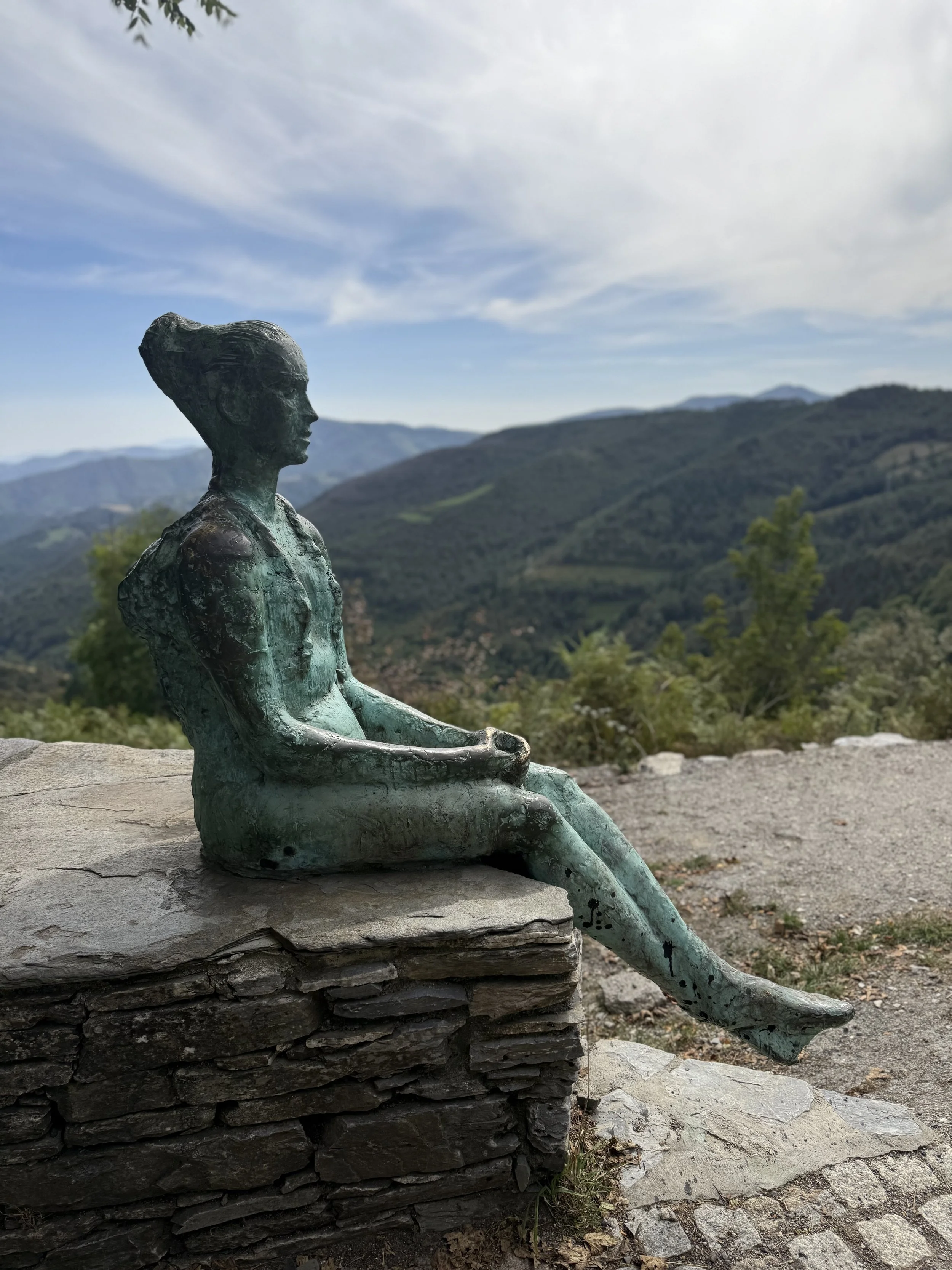 Sculpture of woman enjoying the view