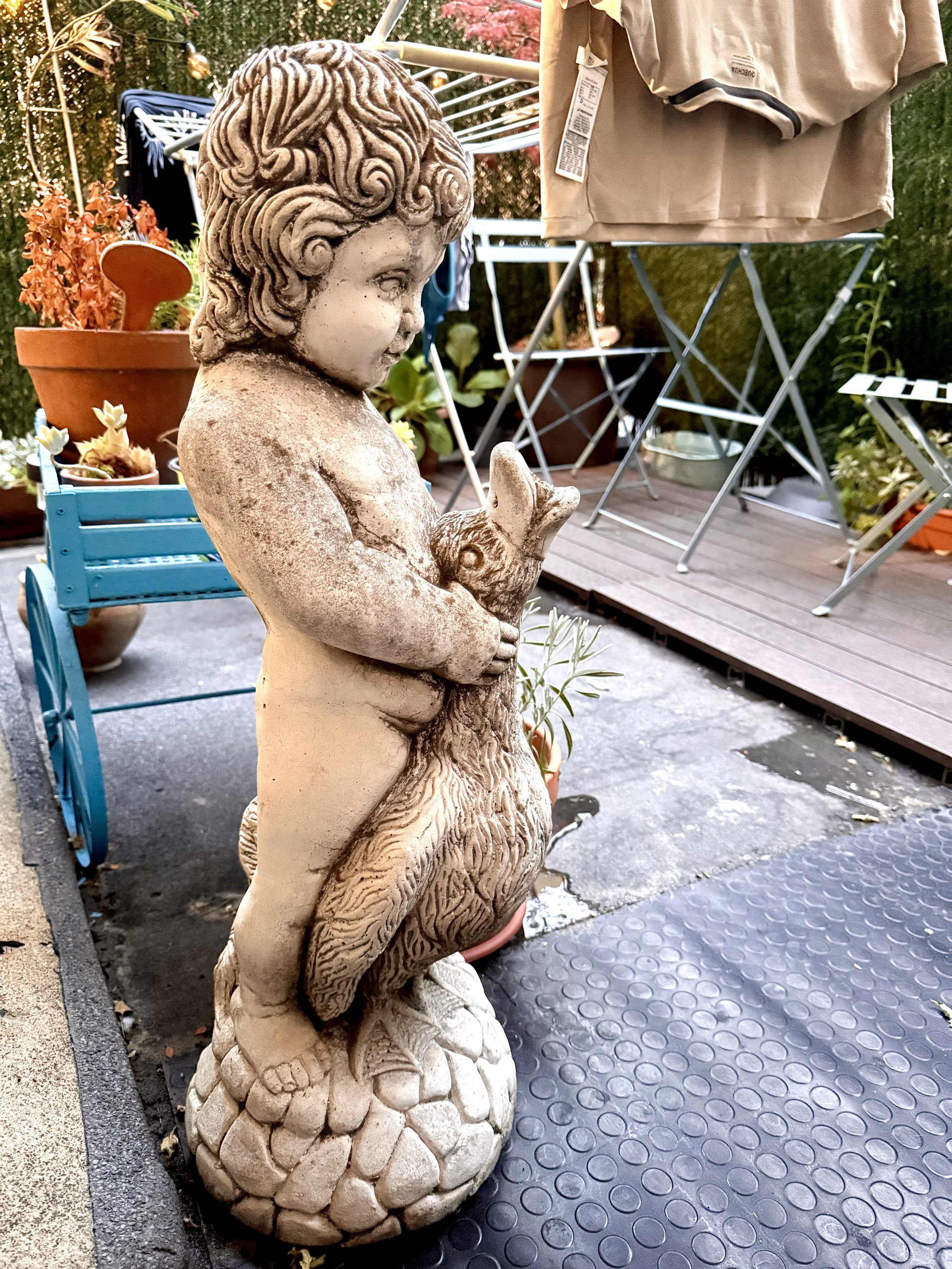 Child and rabbit sculpture