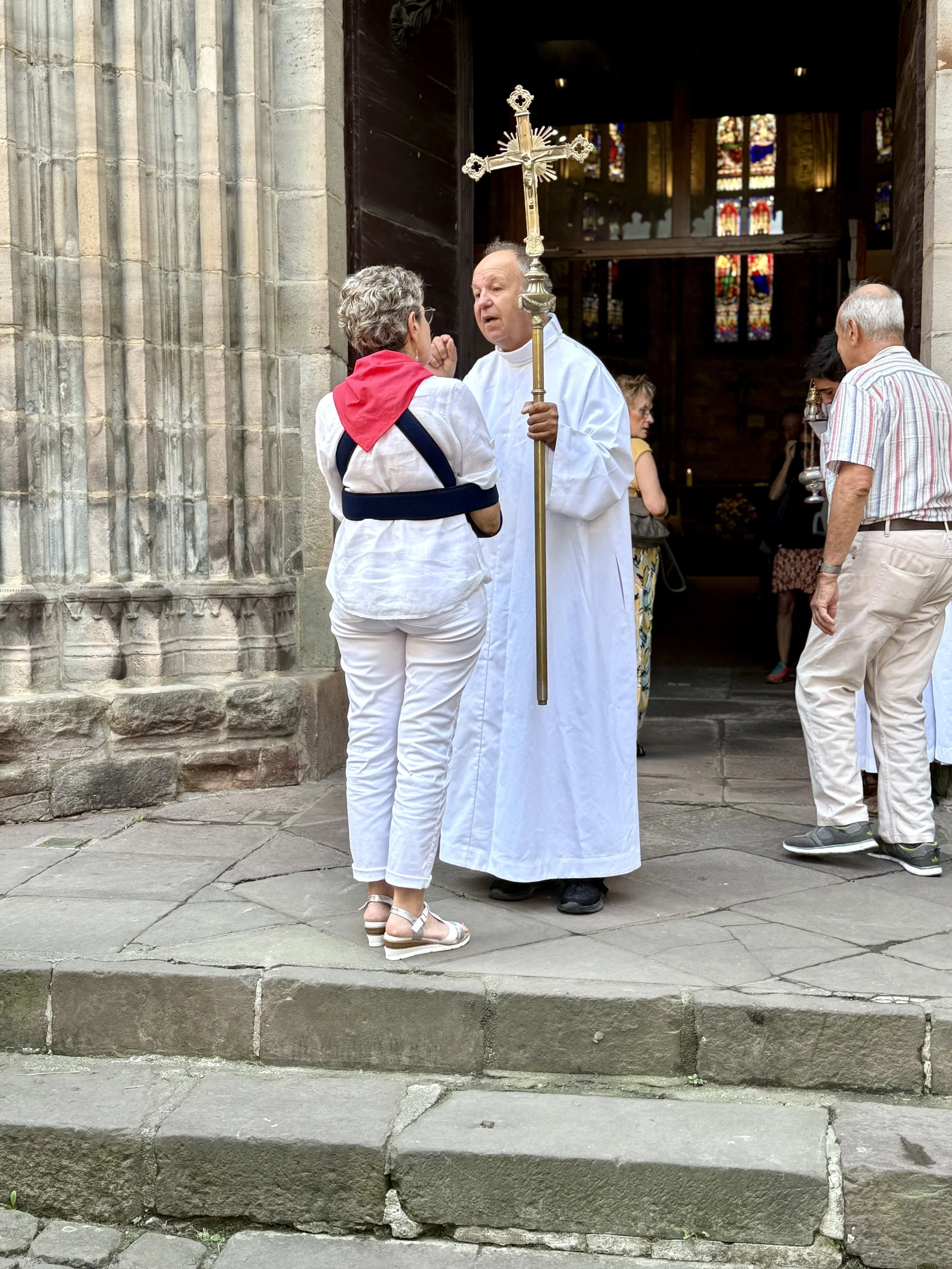 Talking with priest at Spanish church