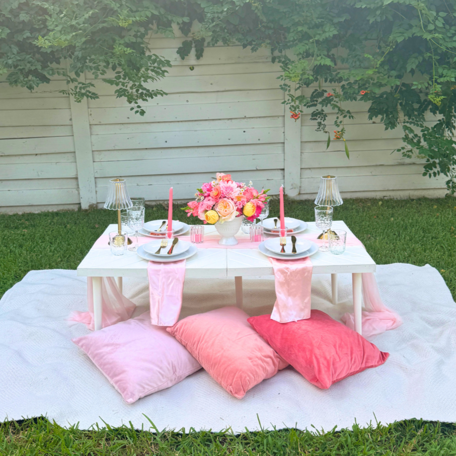 Pink and yellow luxury picnic setup in Dallas, styled by Wanderlust Picnics