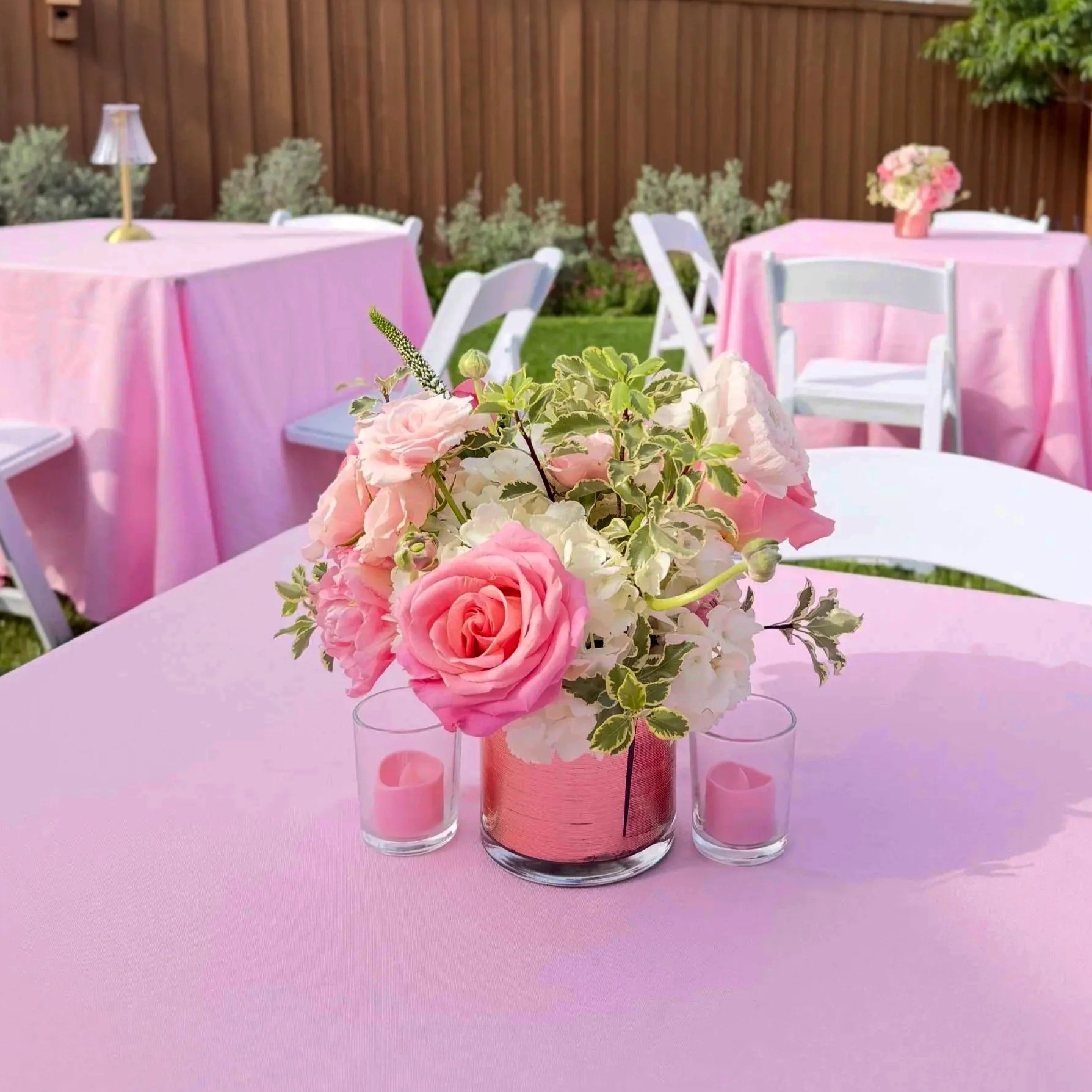 Pink, white and green fresh flower arrangement for a Dallas garden party, styled by Wanderlust Picnics