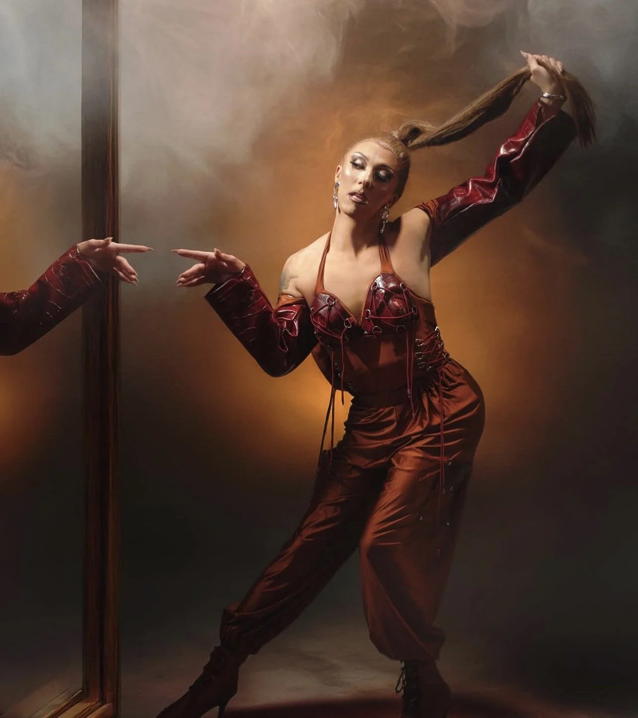 MYA Foxx in custom bodysuit, pants and leather shrug