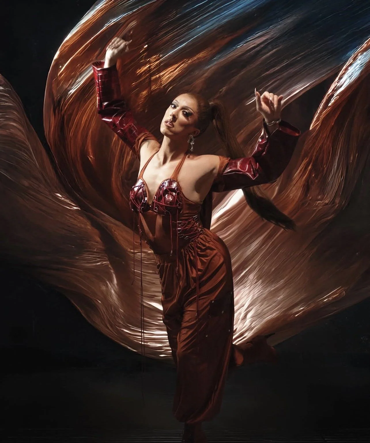 MYA Foxx in custom bodysuit, pants and leather shrug