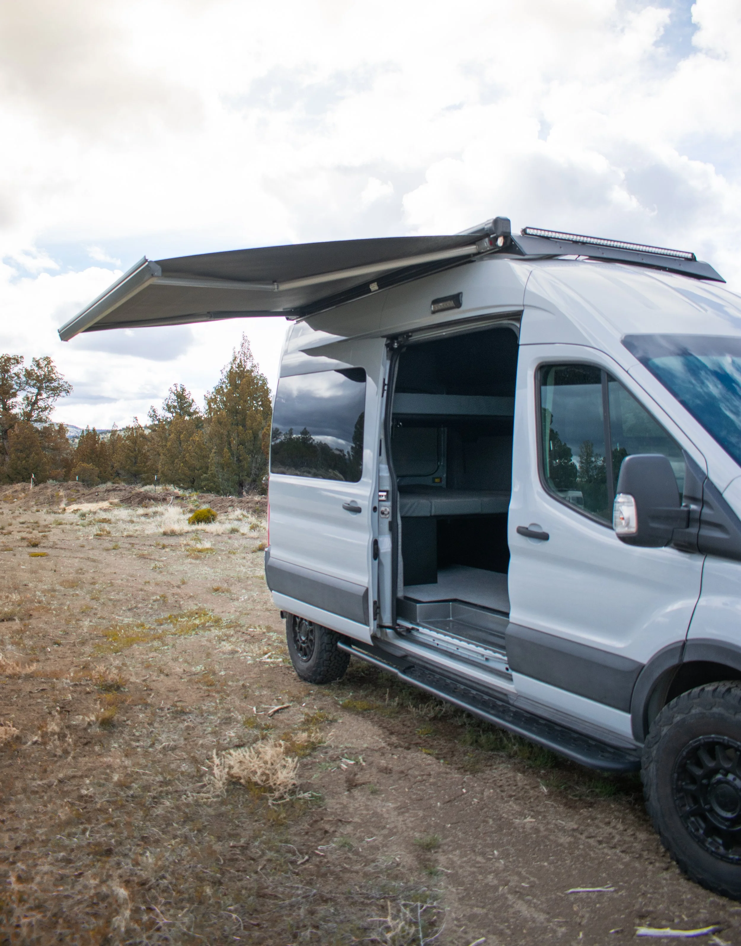 Ford Transit van with Fiamma extendable side awning built by Oxbow Vans in Bend, OR