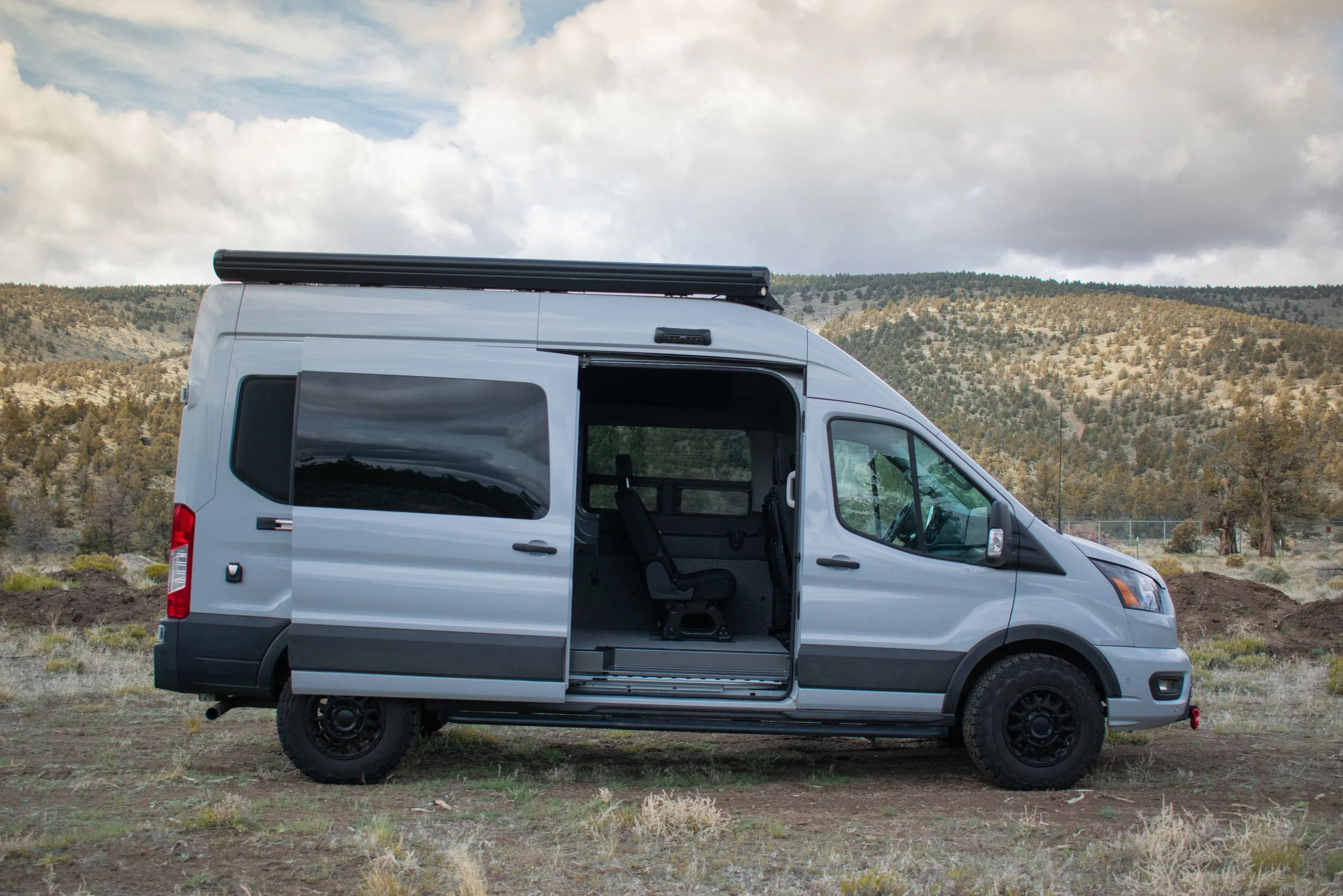 Ford Transit van with rear seating for extra passengers built by Oxbow Vans in Bend, OR
