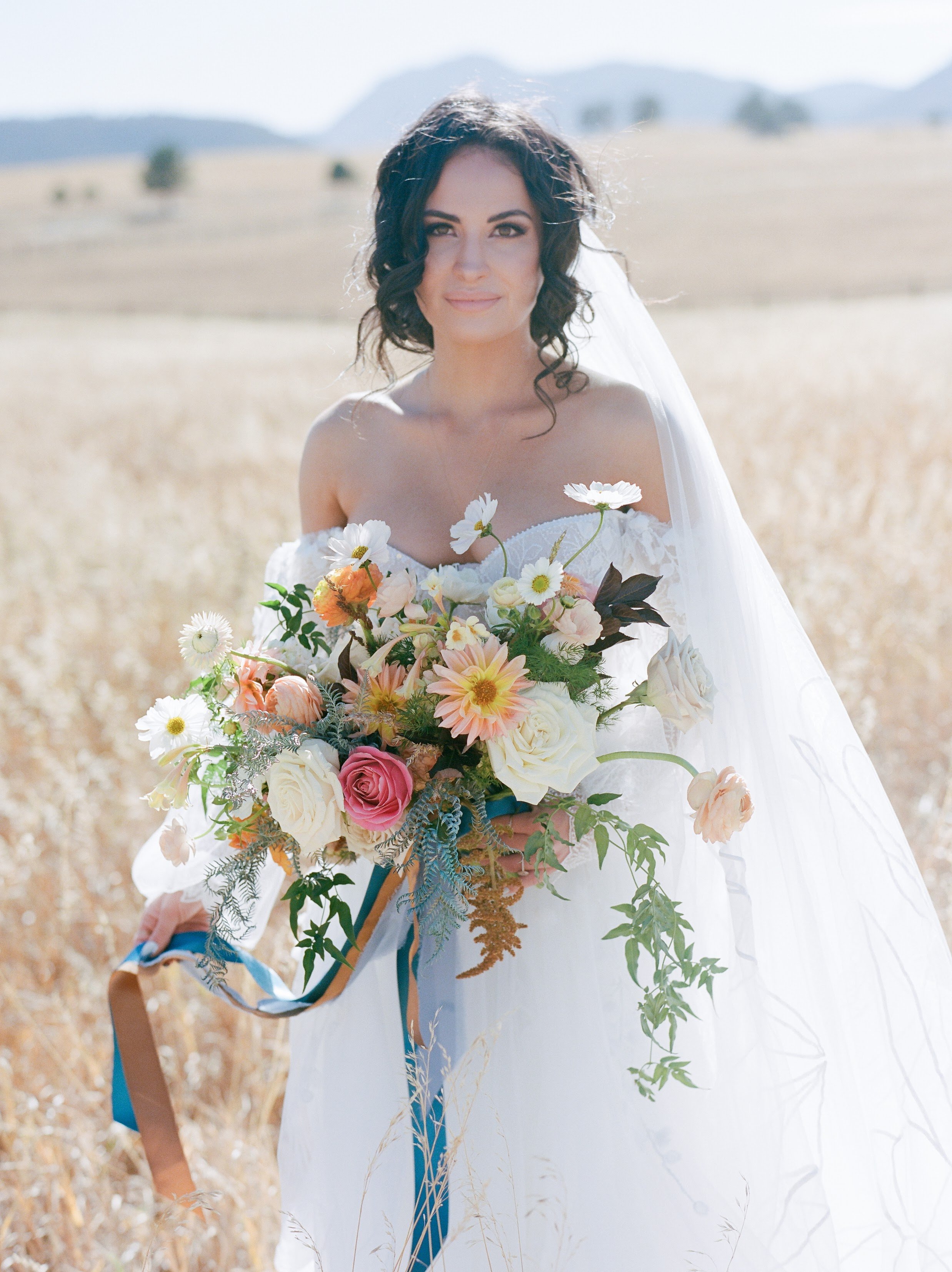 Elegant Rhode Island bride with garden style bridal bouquet 