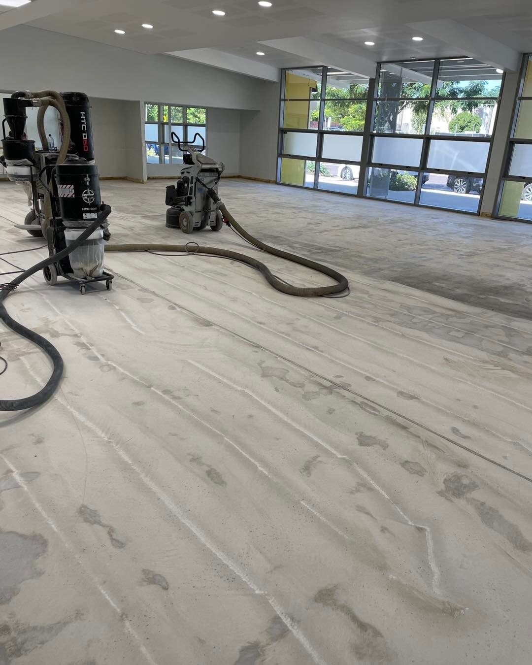 Uplift. Prep. Install.

After removing the old flooring we discovered an expansion gap had been covered over, causing the existing floor on top to fail. 

By installing the correct expansion stripes we were able to install new floor while leaving a s