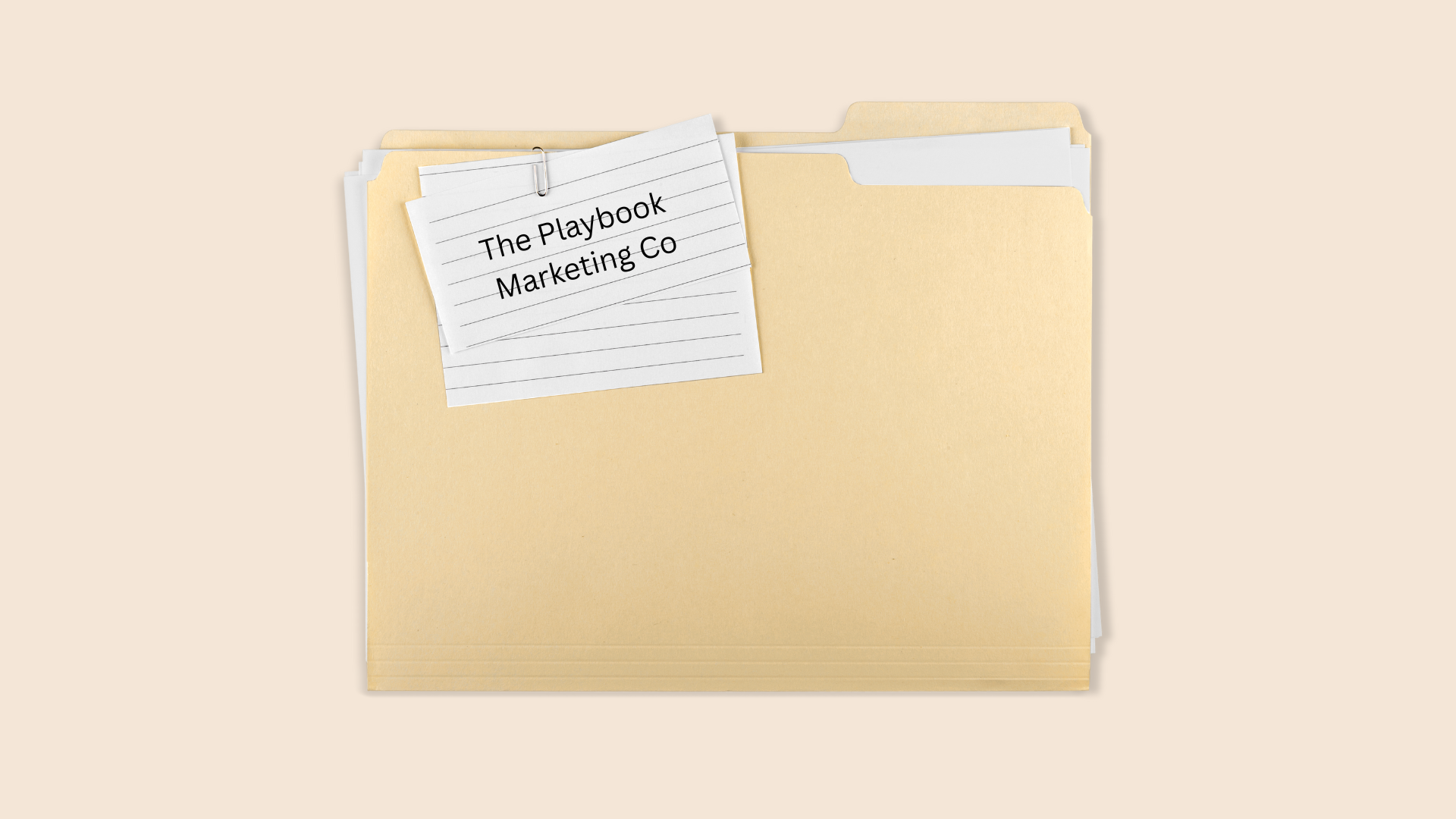 A yellow file folder with a lined note paper clipped to the top left, labeled "The Playbook Marketing Co".