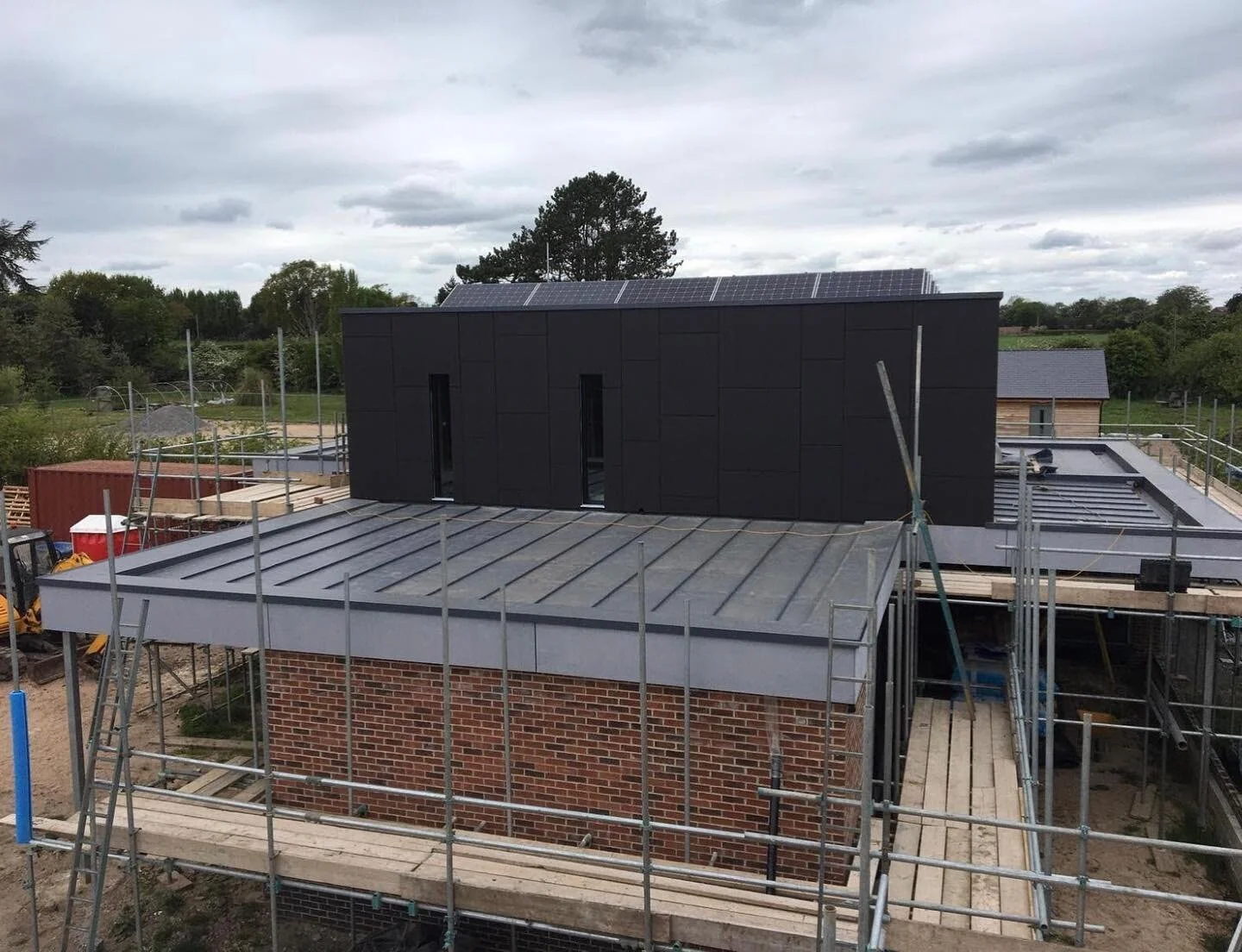 Customers dreams made reality with this eco friendly house, Iko Armourplan single ply and Trespa panel cladding  #roofing #flatroofing #flatroofingspecialists #flatroofingcontractor #singleplyroofing #ecofriendly #ecofriendlyhouse #ikoarmourplan