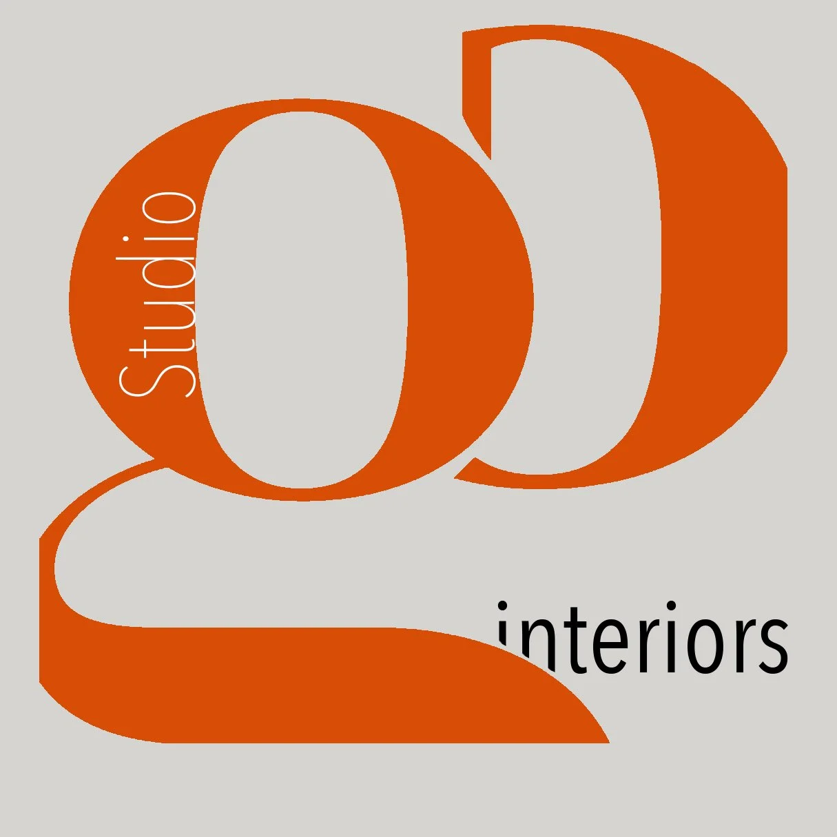 Logo of Studio GD Interiors with large orange and gray stylized letters GD and the words 'Studio' and 'interiors'.