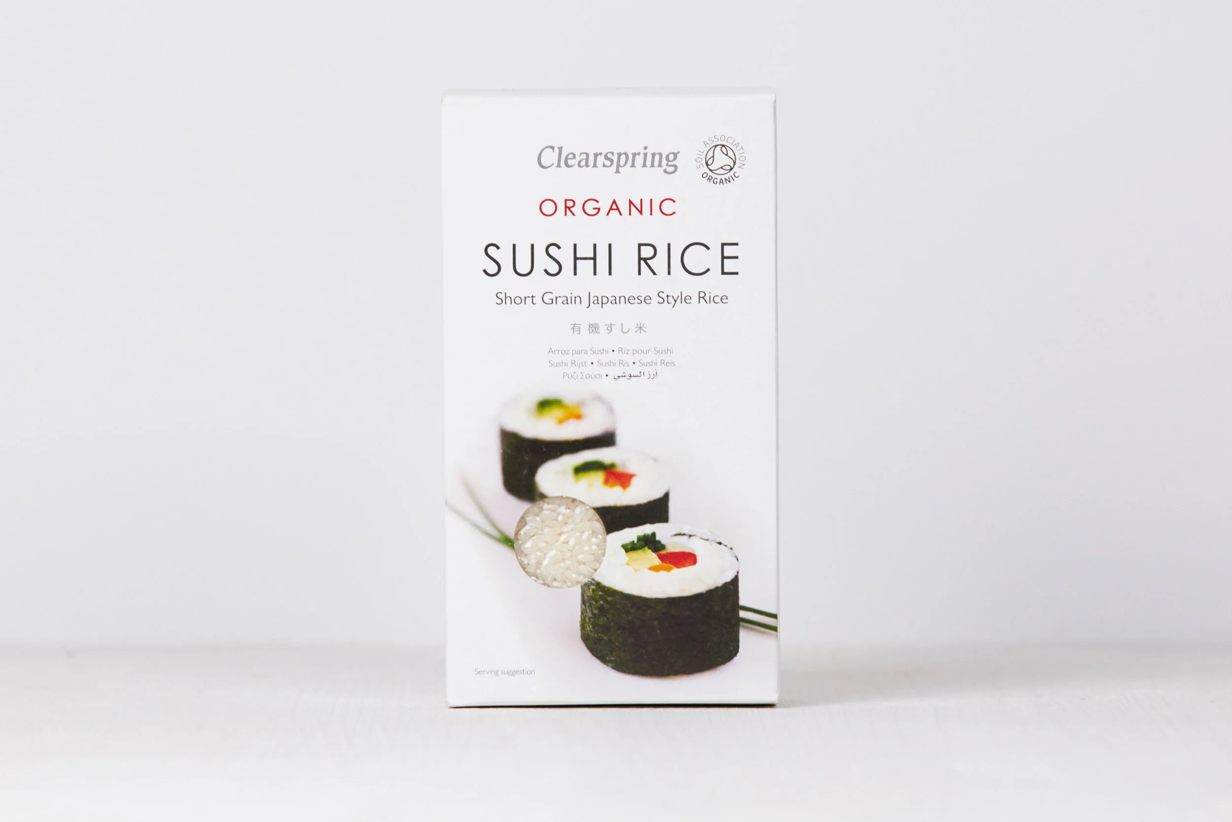 A white box of Clearspring organic sushi rice showing three sushi rolls with nori, rice, and colorful fillings.