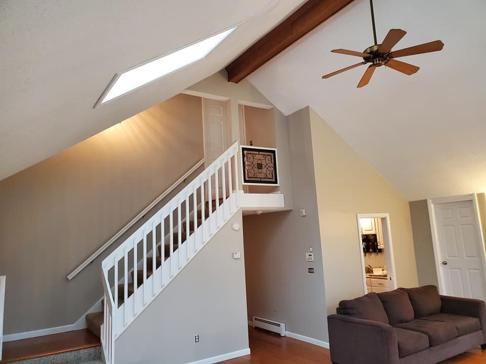  Northeast Painters, LLC after living room tall ceiling 