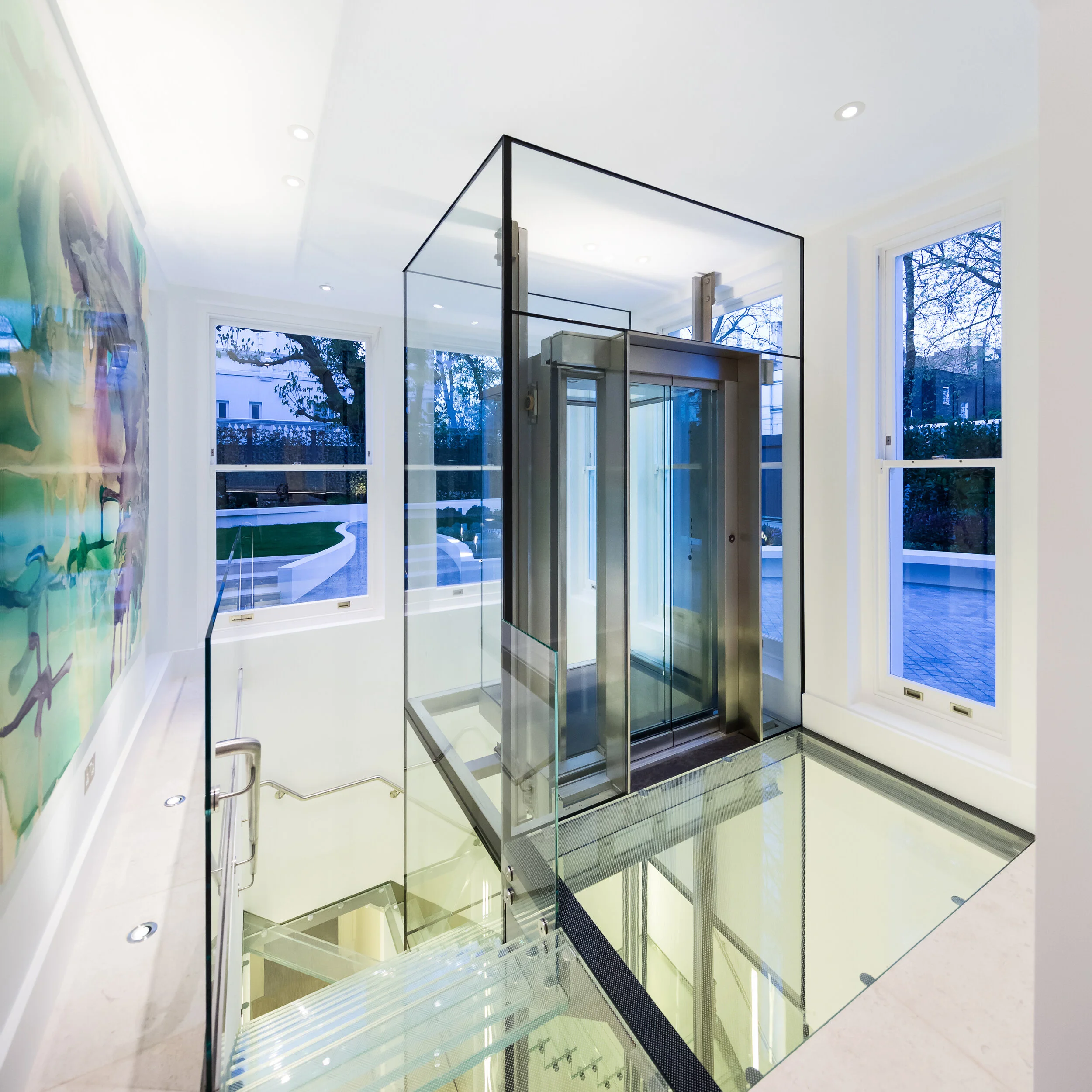 03_Lower Grd_Lift with Glass Stairs_Three Quarters_Dusk_DAV_6605_Cropped_01a.jpg