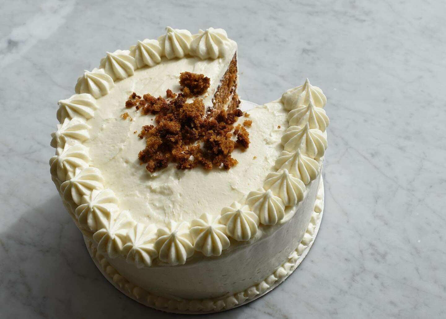 Carrot cake is back! Grab a slice at Fairmount or our Van Aken location. 
Our carrot cake is filled with golden raisins, candied ginger, and topped with a cream cheese frosting (*No Nuts!*)
 
Stop in and take a slice or place an order for a full cake