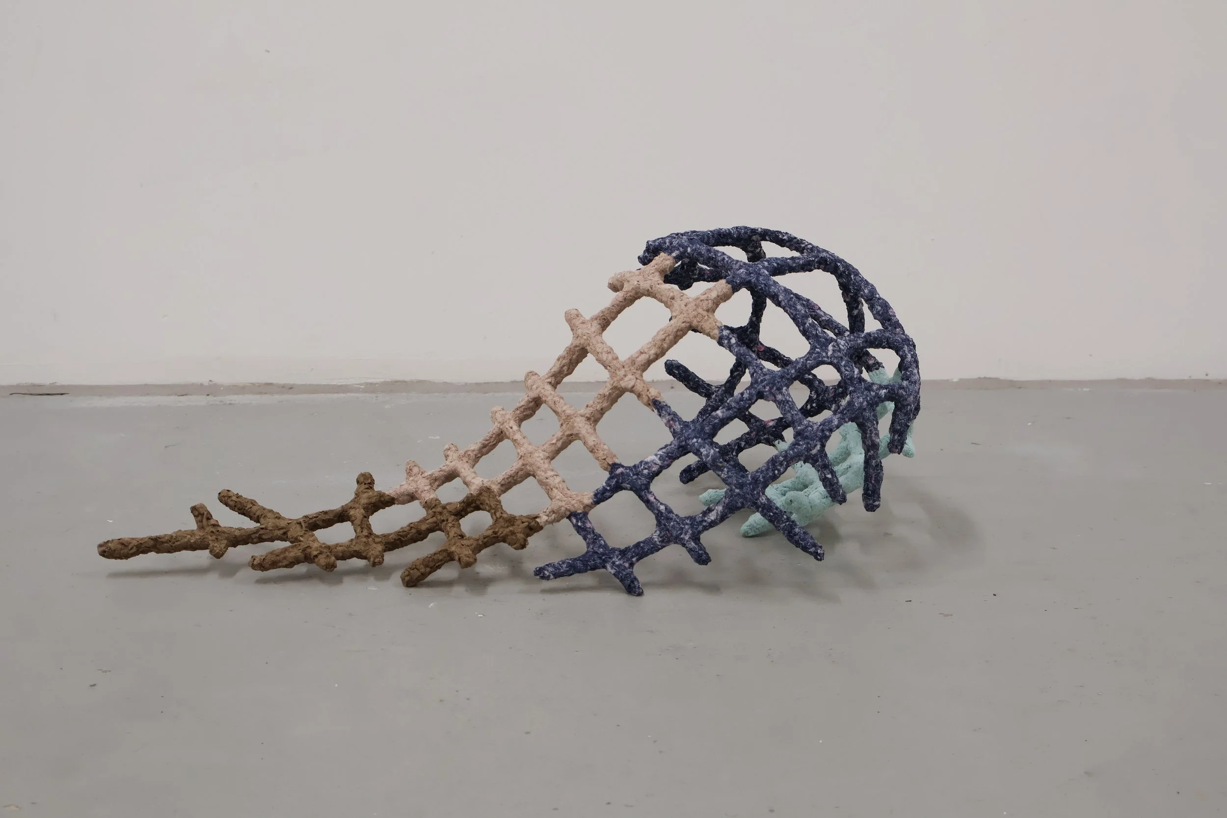 Crawling, breathing_2026_65x35x24cm_Recycled clothing and steel_2.jpg