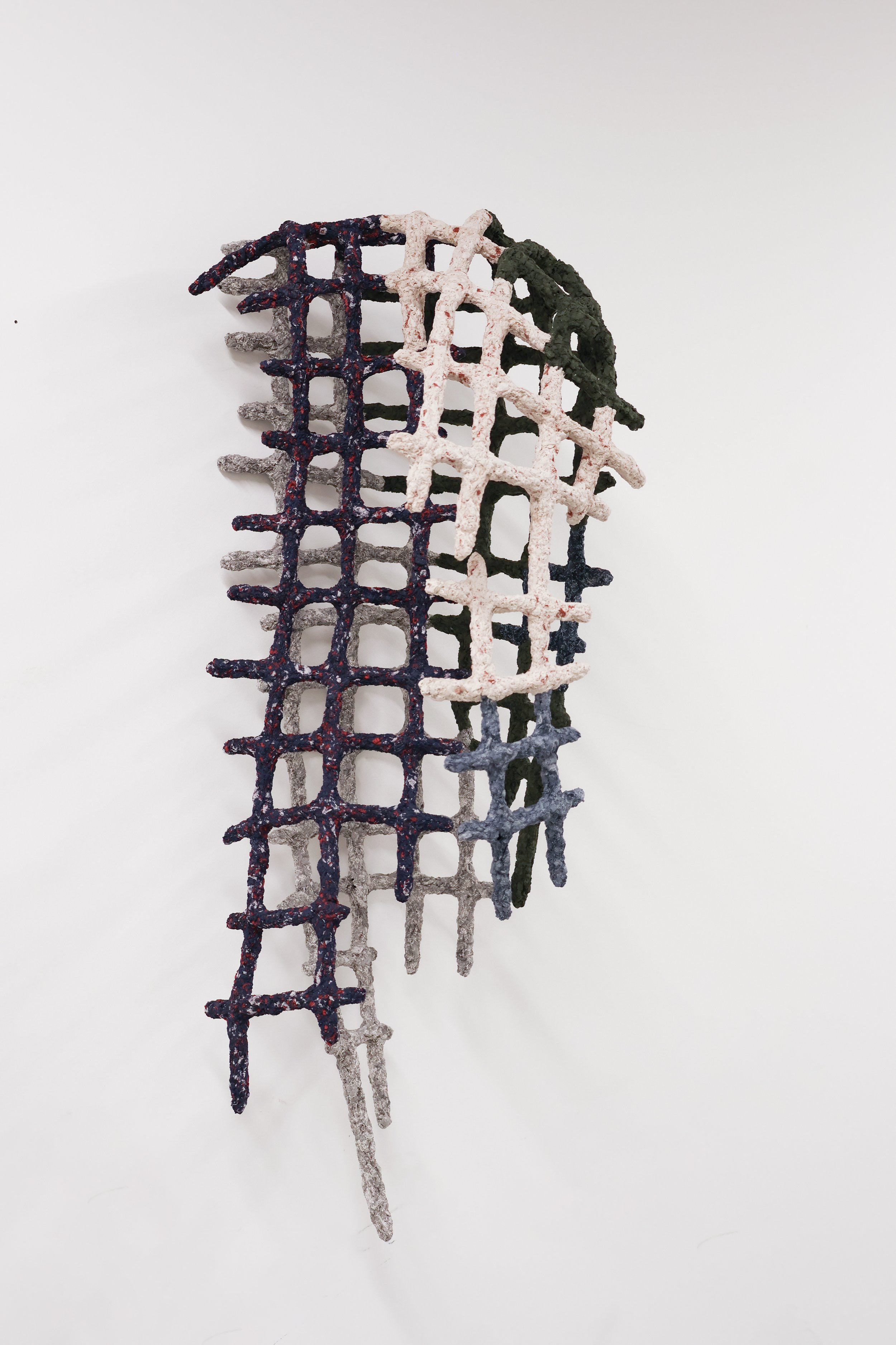 Torso I_2026_34x30x79cm_Recycled clothing and steel_4.jpg