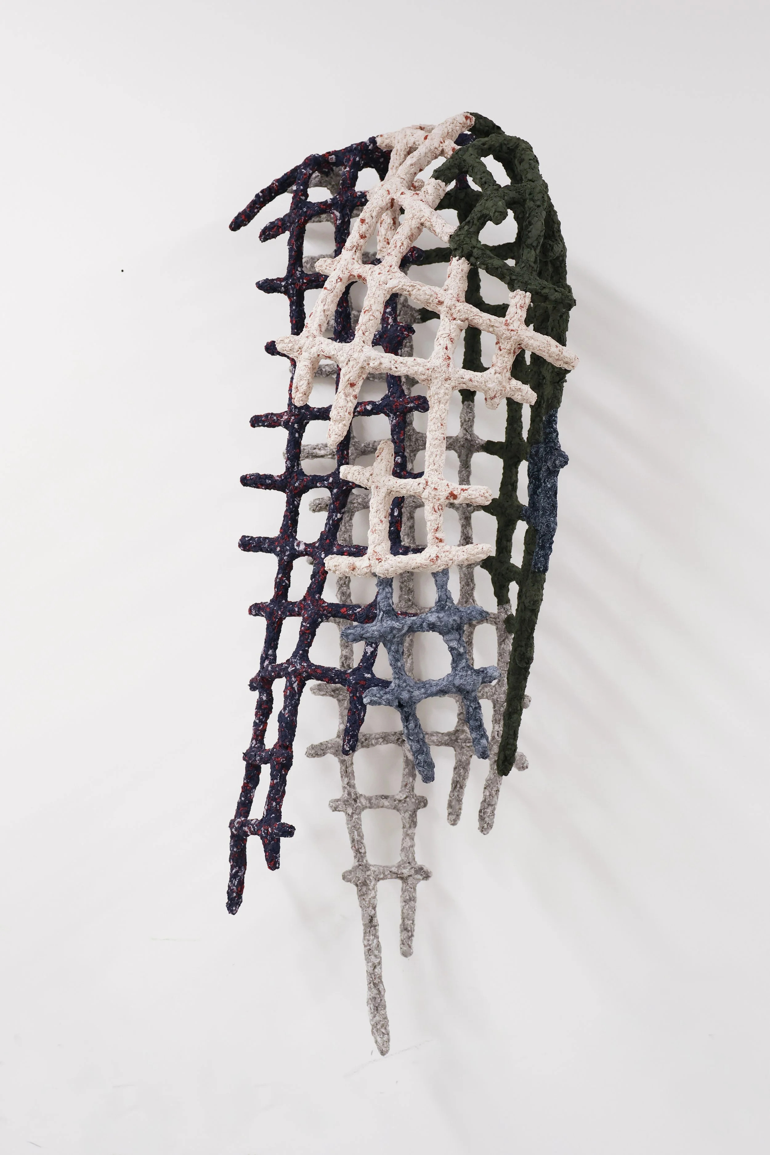 Torso I_2026_34x30x79cm_Recycled clothing and steel_1.jpg