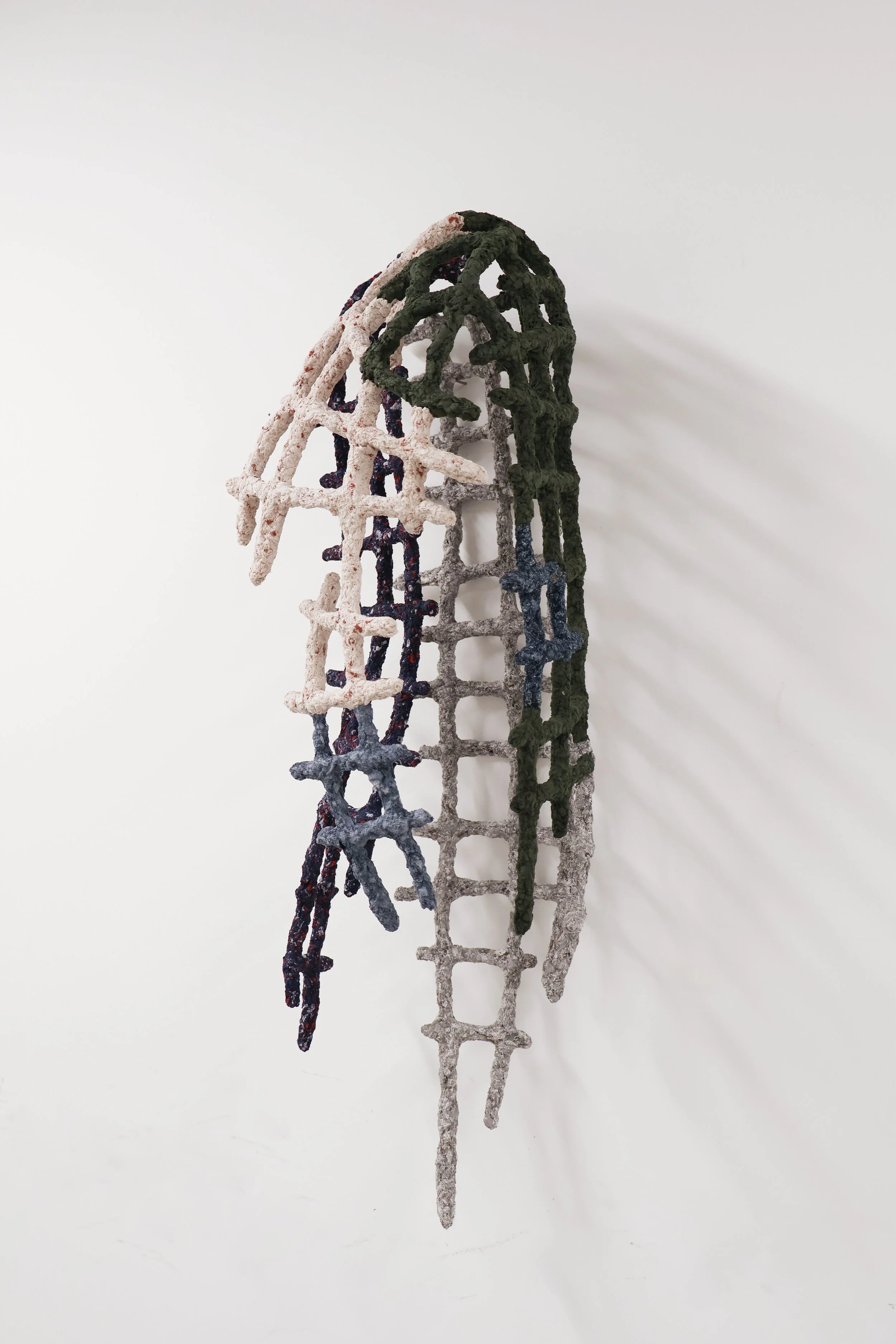 Torso I_2026_34x30x79cm_Recycled clothing and steel_3.jpg