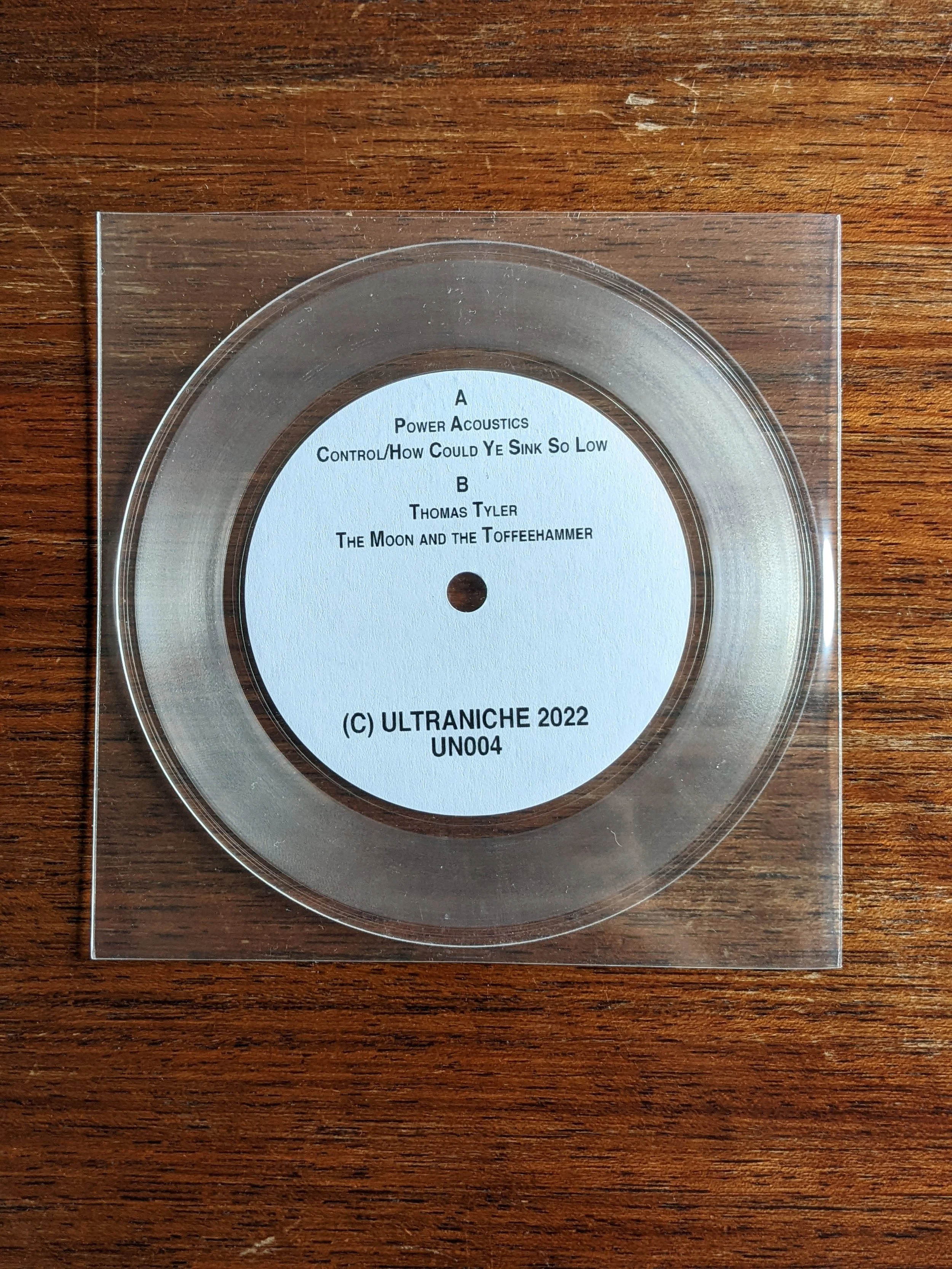 power acoustics clear vinyl back with a/b side label