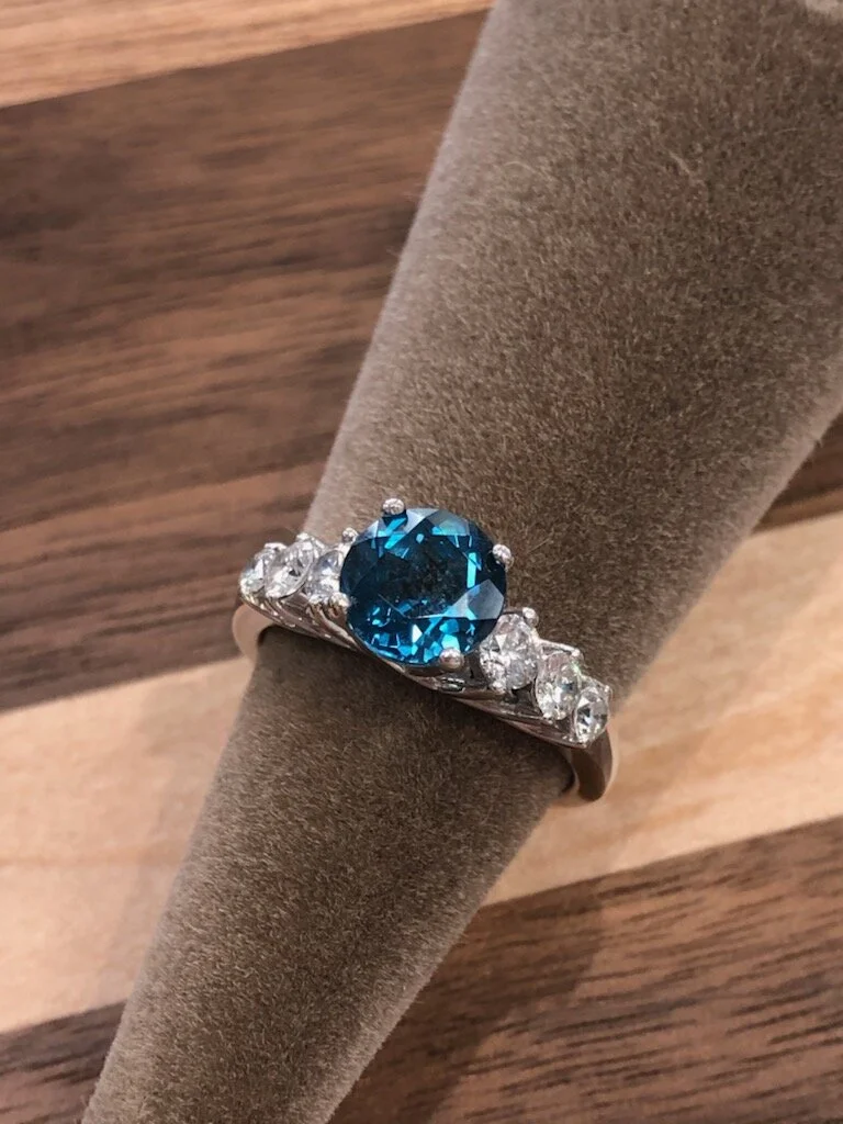 Blue Topaz and Diamond Ring