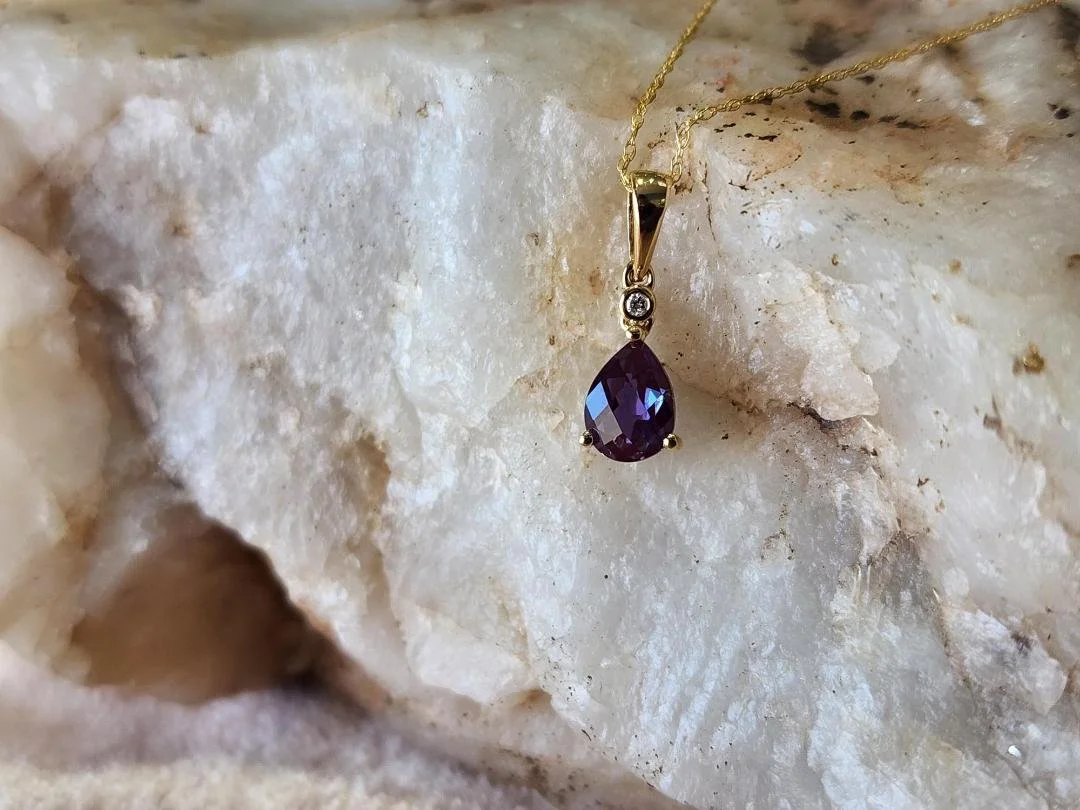 created alexandrite necklace with diamond accent on white quartz