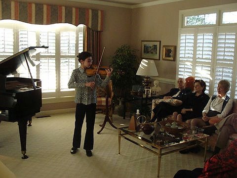 Sophie Leruth performs for guests