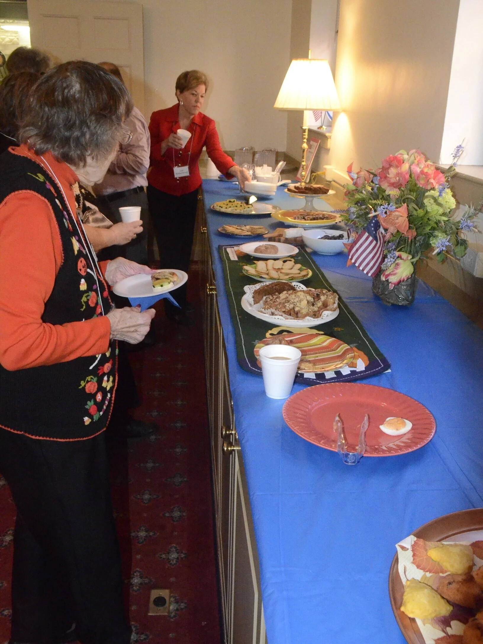 WMC members and guests enjoy coffee and refreshments