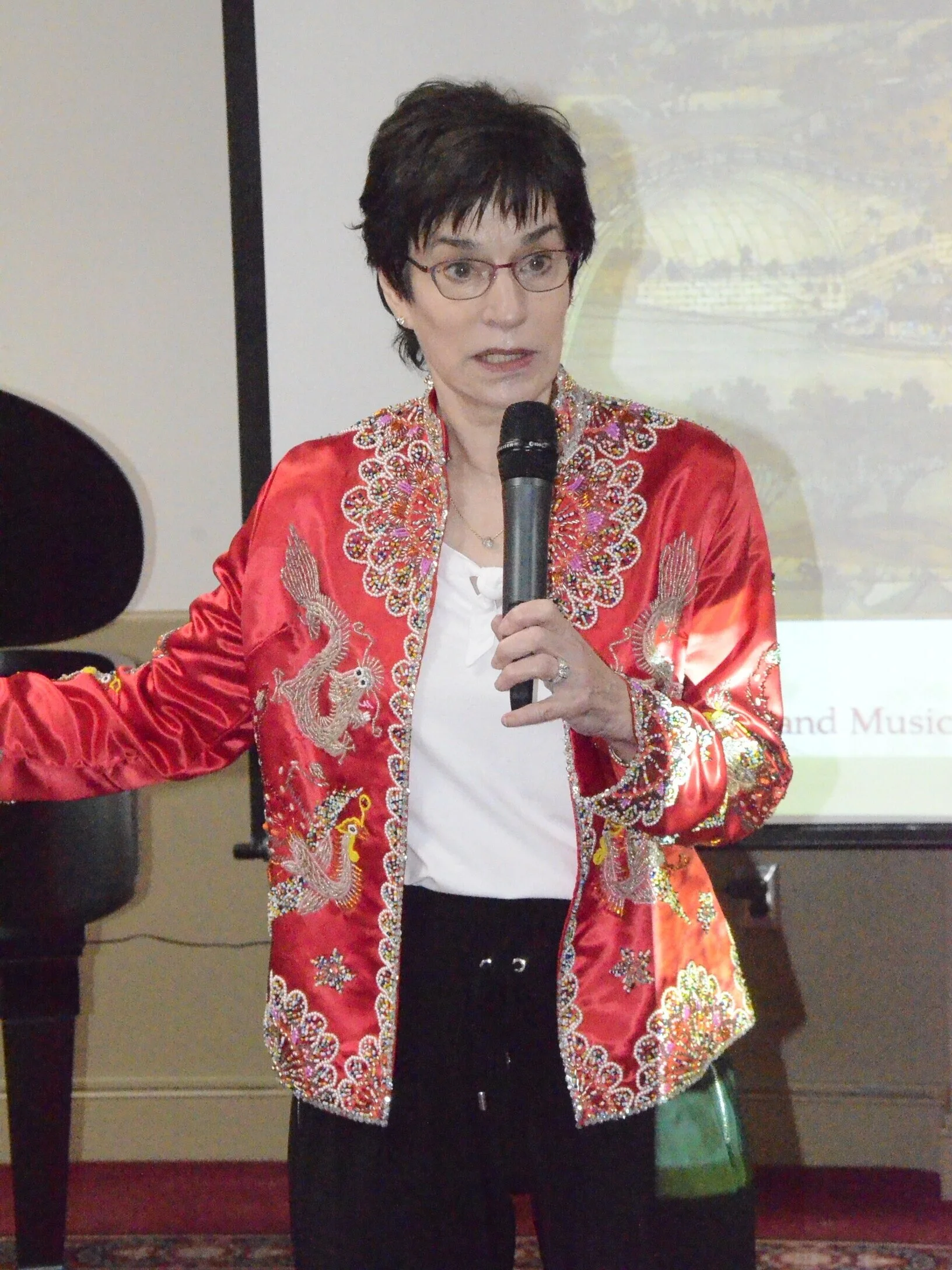 Terry Murphy, First VP: Programs, introduces the Dec 18th artists