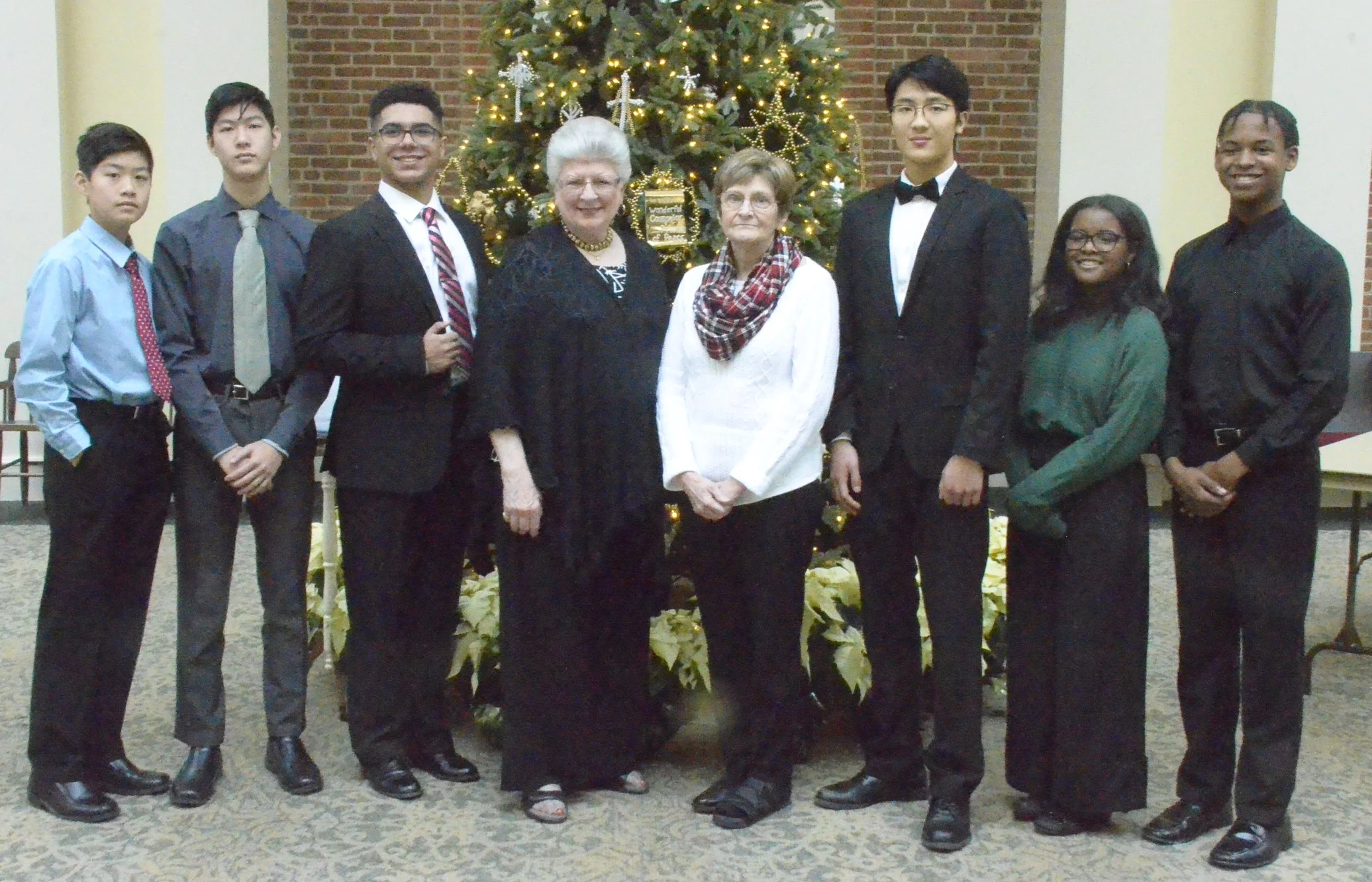 The students:  Matthew and David Fan; Christopher Kirby-Saunders; Edric Han, Sydney and Brelan Jenkins; with Donna Herman, President; and Barbara Stahl, Accompanist