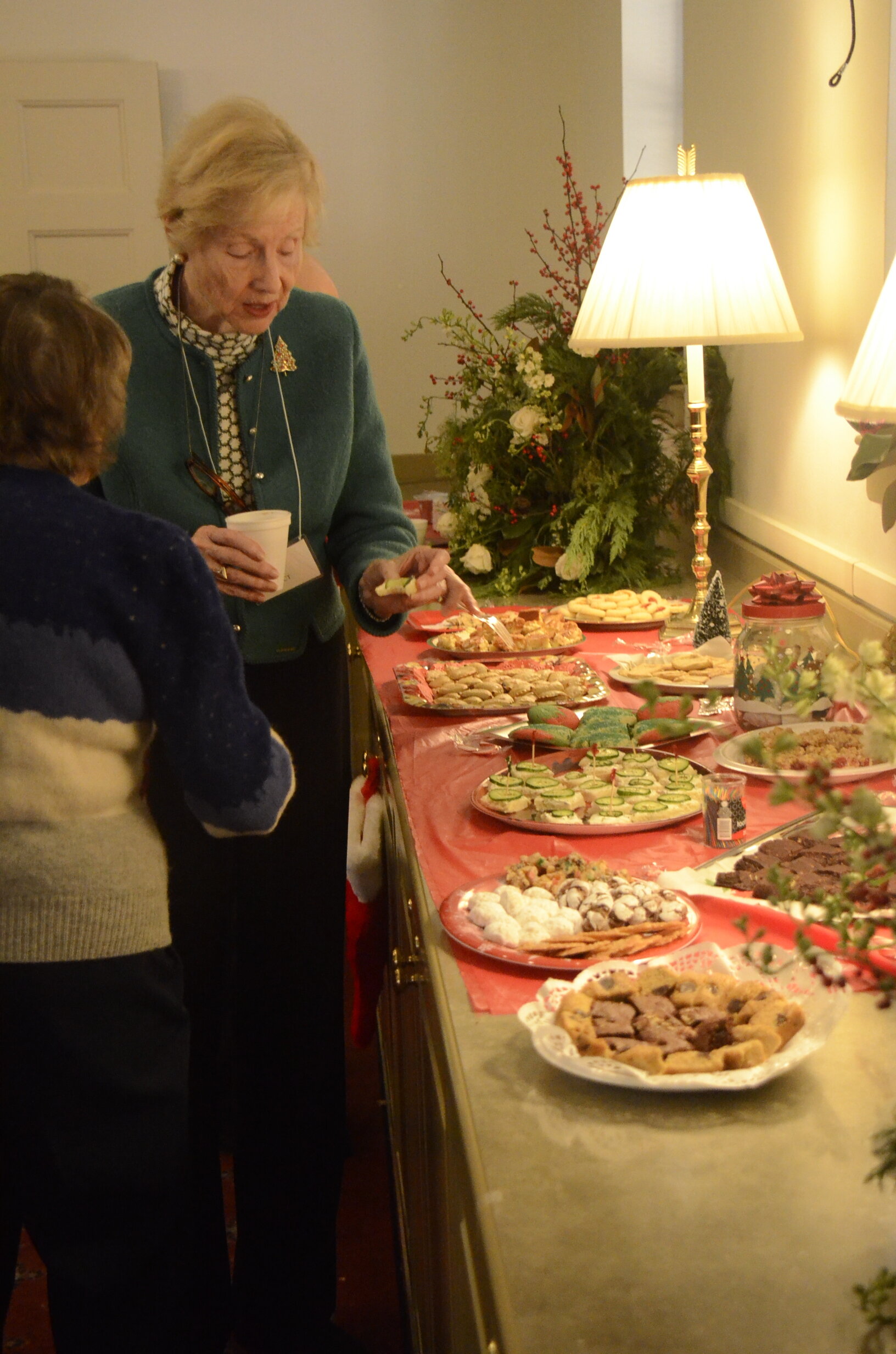 Elaine Benedict, WMC member, at the Hospitality buffet