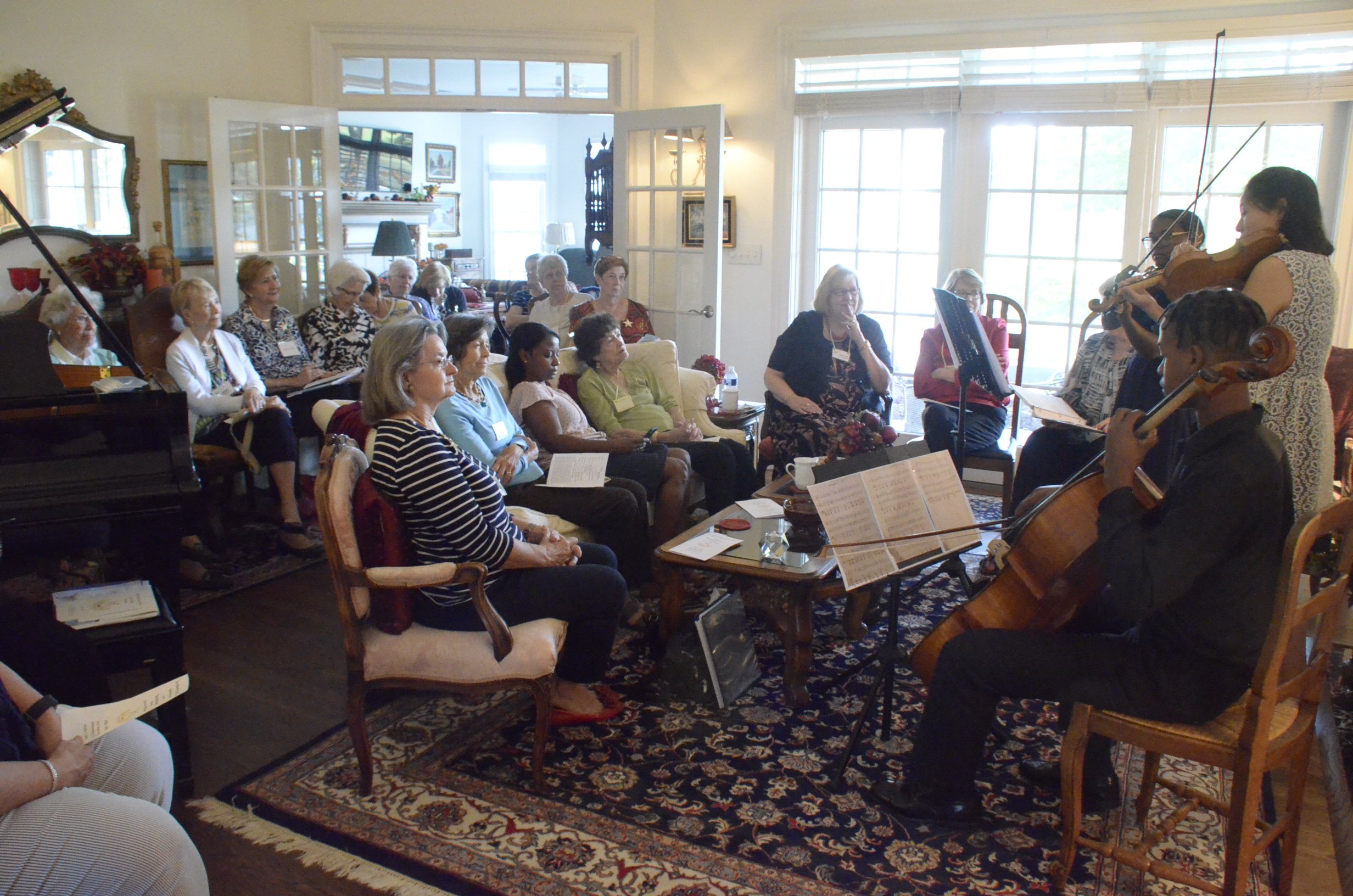 PEO members enjoying the performance by Sydney Jenkins, Yunseo Chung, Brelan Jenkins