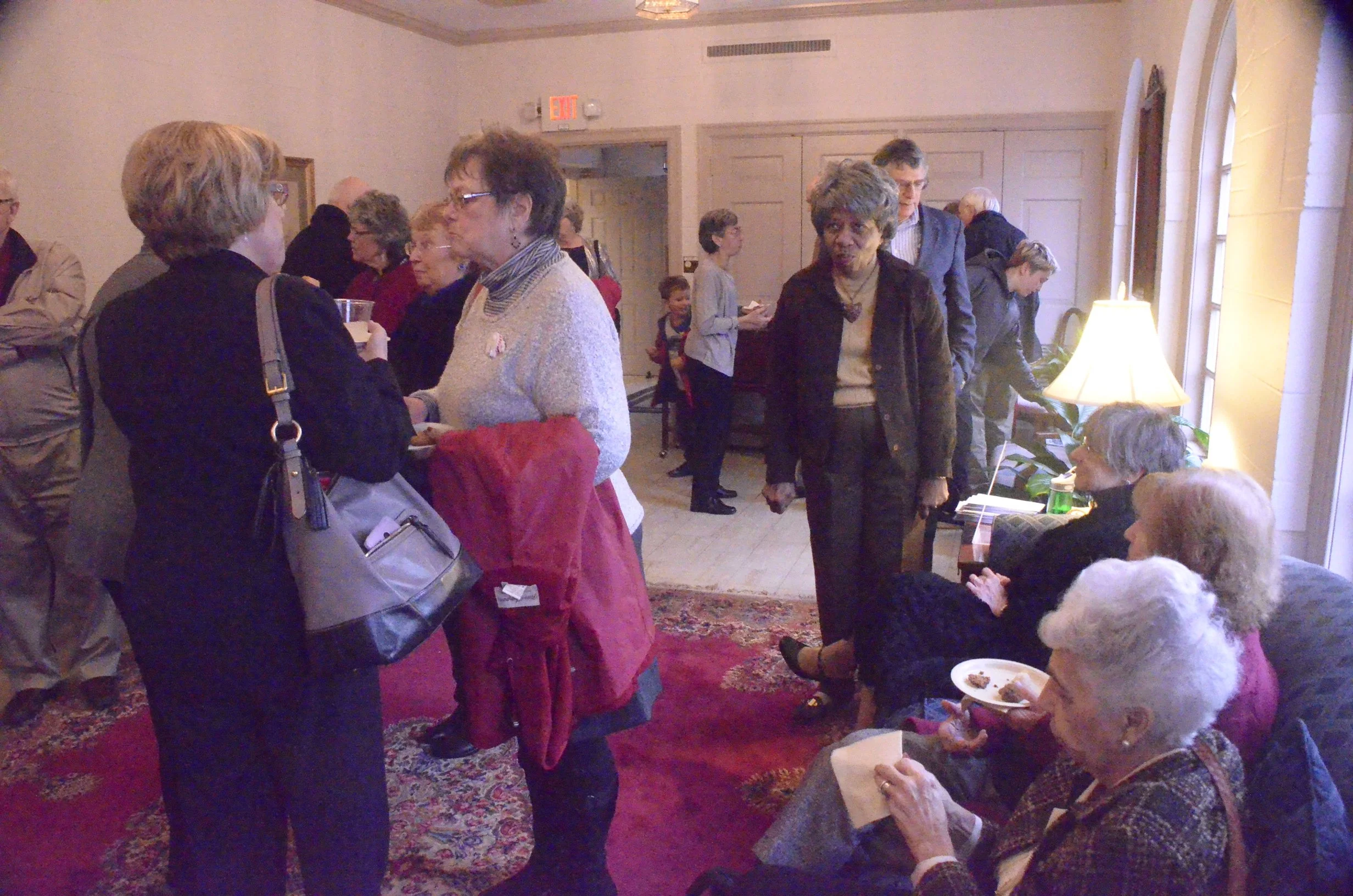 Benefit guests enjoying refreshments