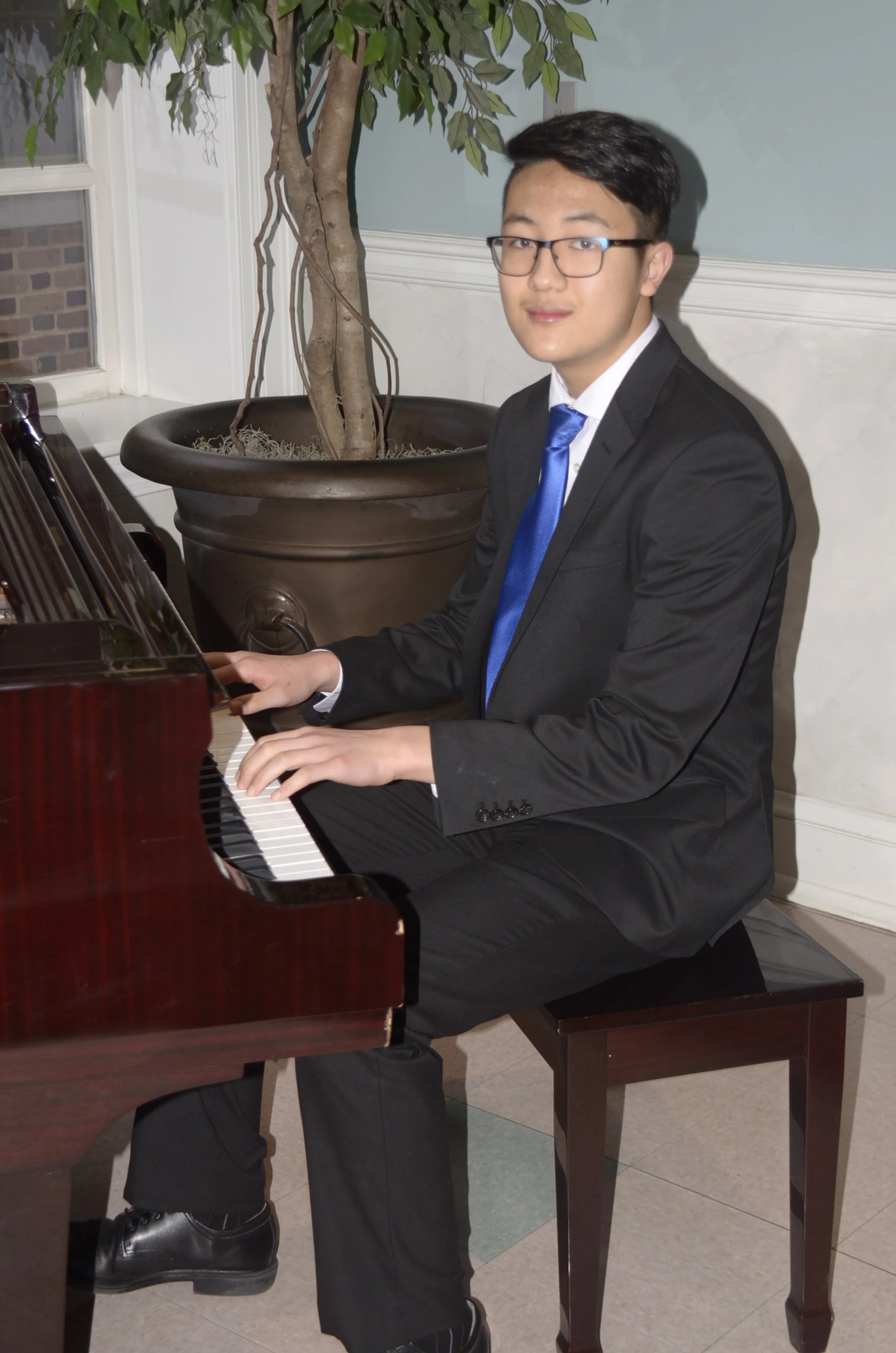 Sr. D.:  Edric Han, Piano; Honorable Mention and Encouragement Award of $400