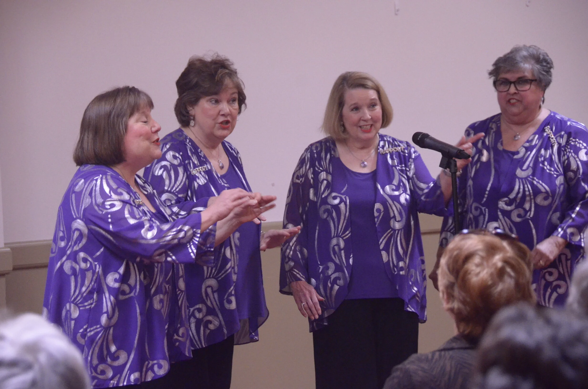 Singing in four-part A capella harmony