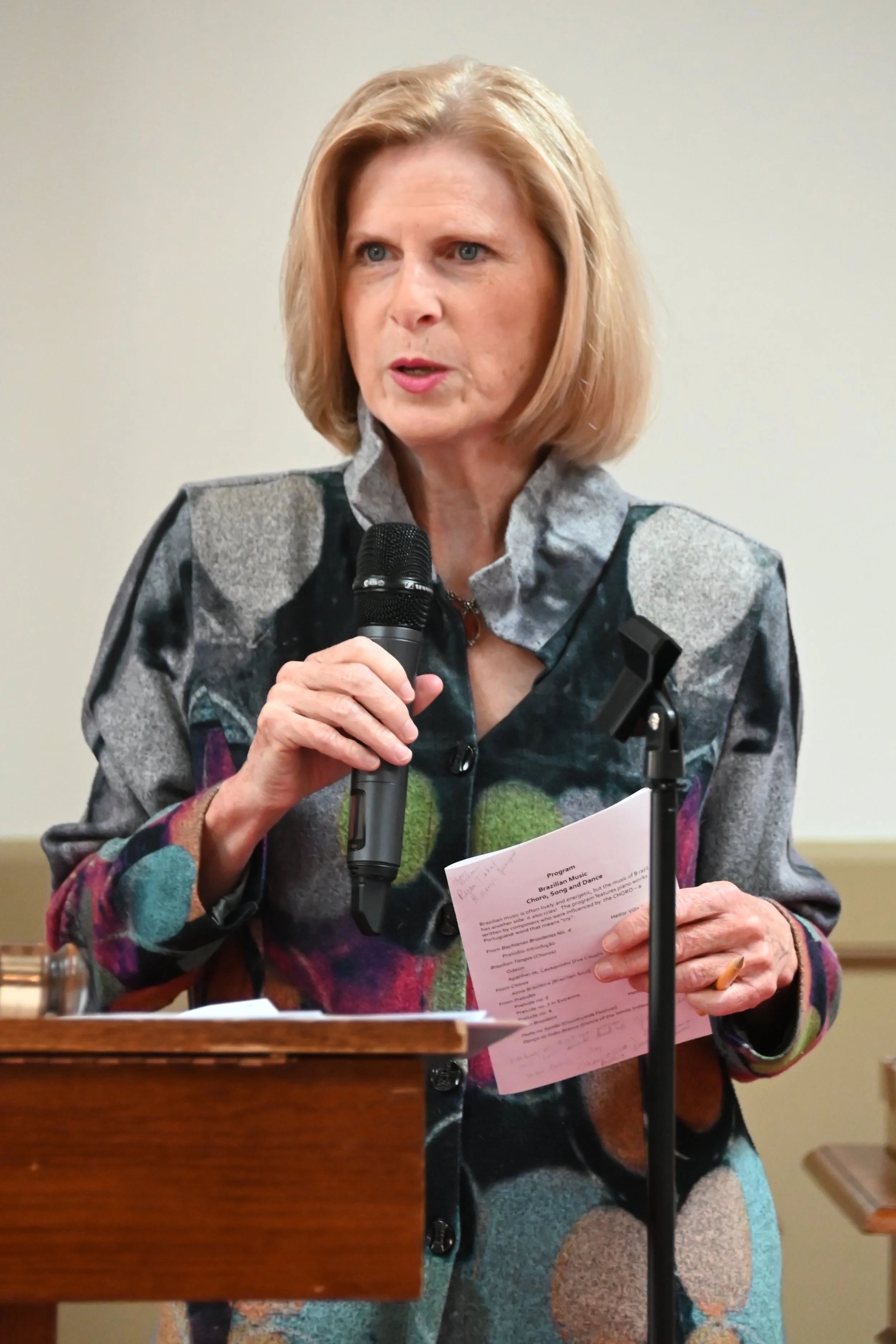 Alisa Bohon, VP Programs, introduces Dr. Paulo Steinberg, Pianist