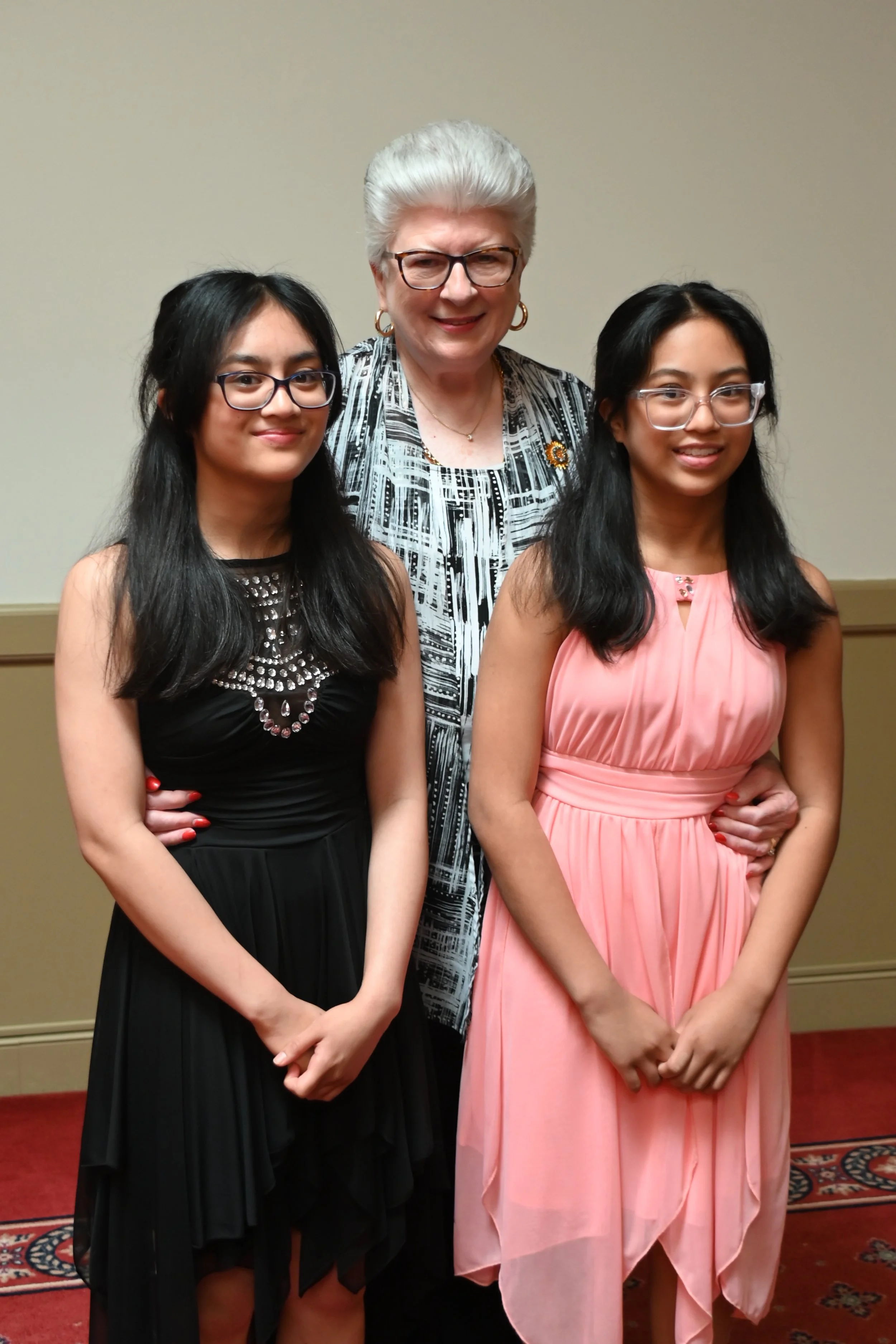 Sisters Maxyn and Hally Hallare, and Donna Herman