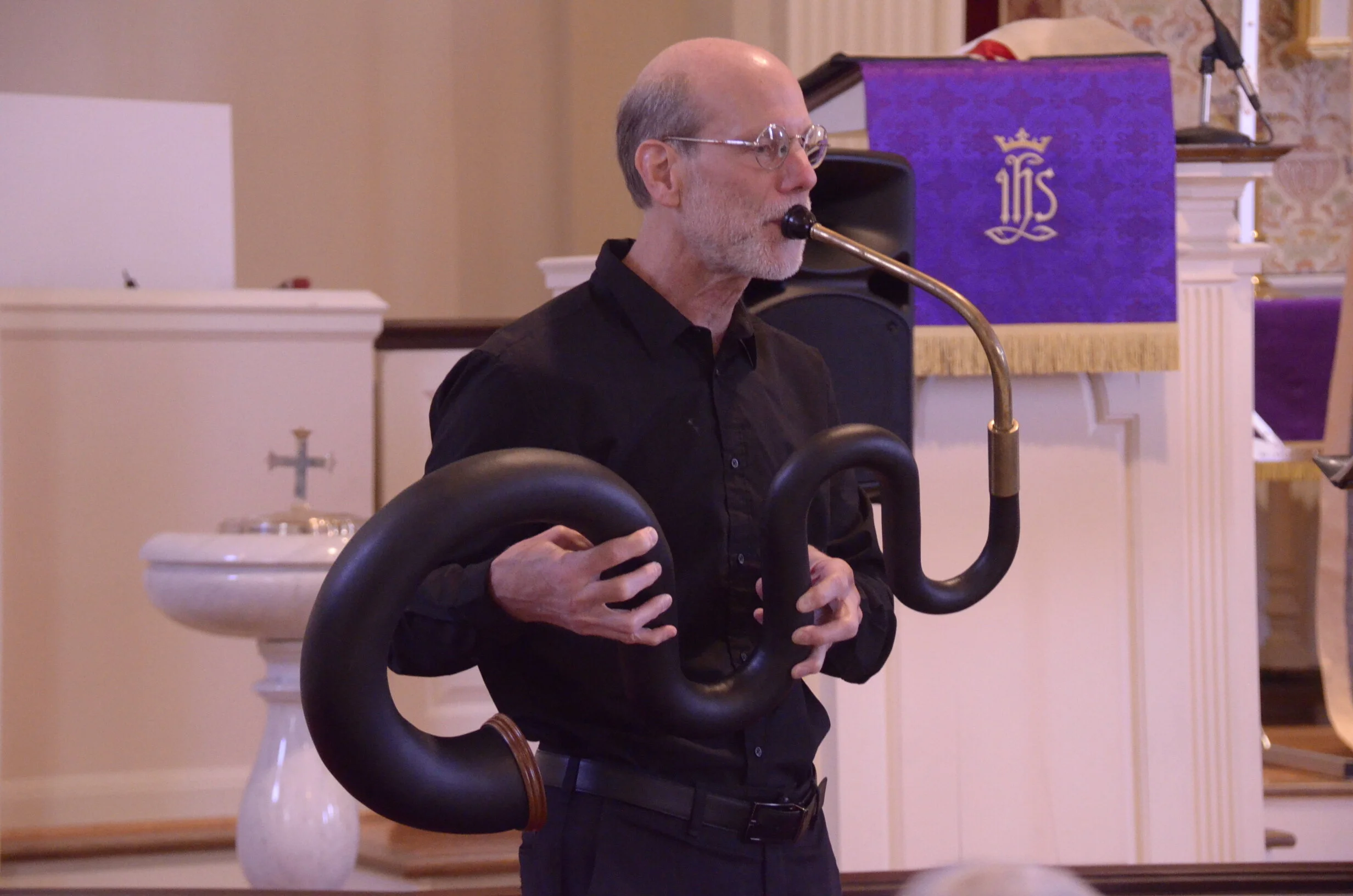 Keith Griffieon plays the serpent, bass member of cornetto family