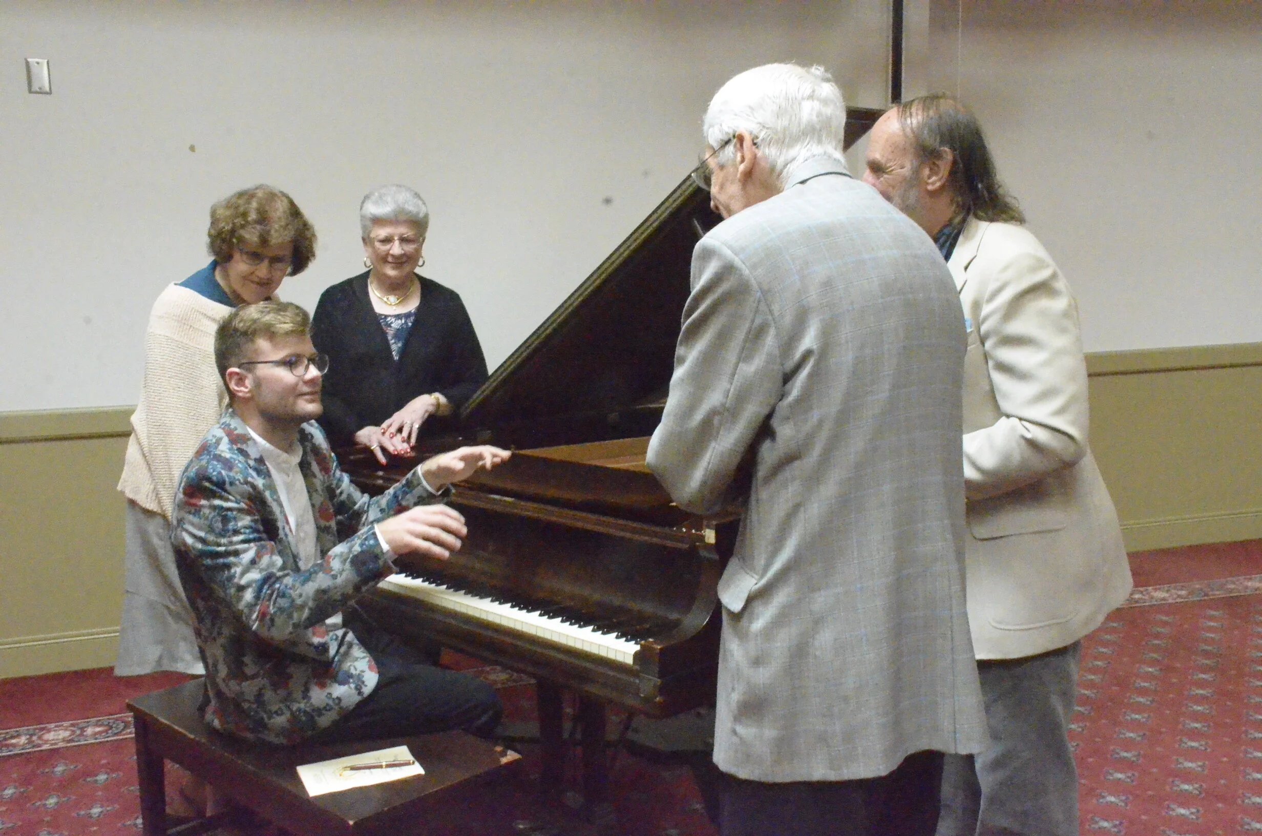 Adam discuses music with Charlene Campbell, Donna Herman, Bob Casey, Gary Shelly