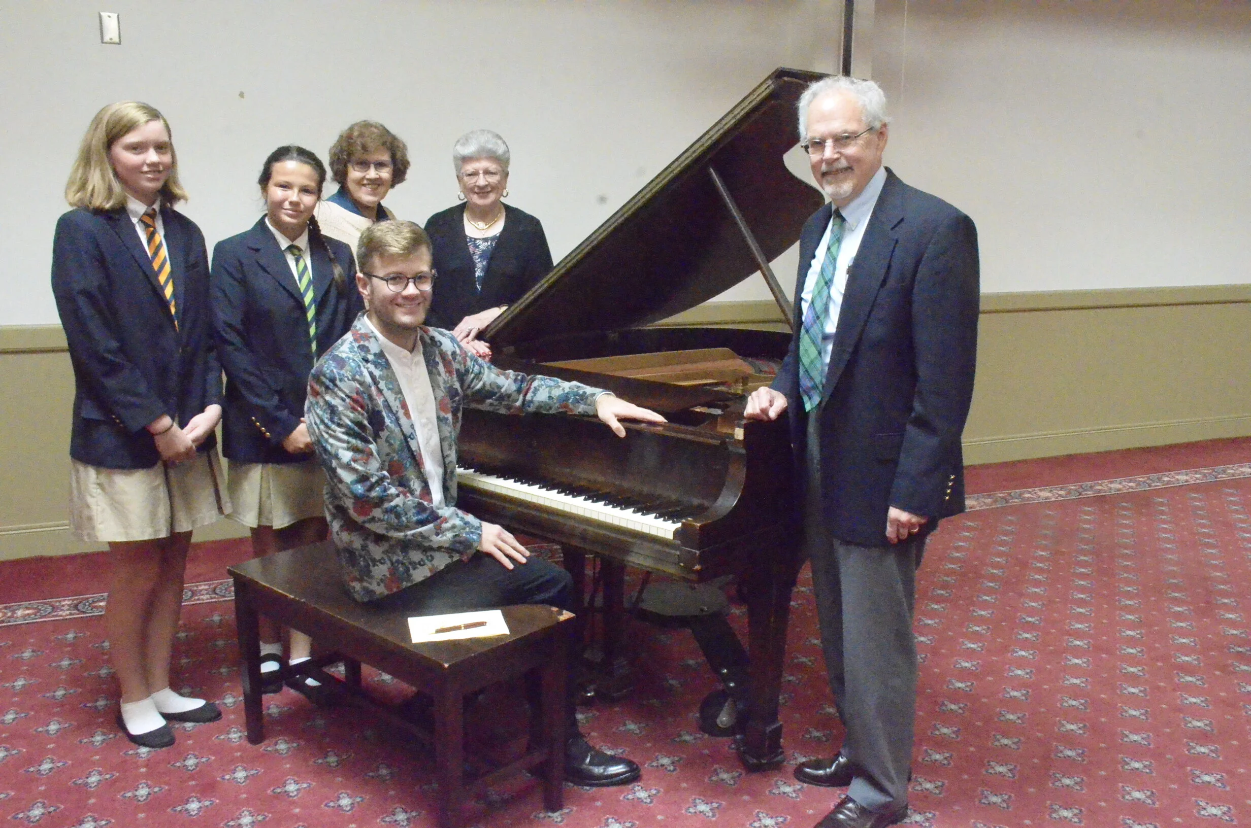 Providence Classical School students and Timothy Seaman, with Adam C. Scott, Charlene Campbell and Donna Herman