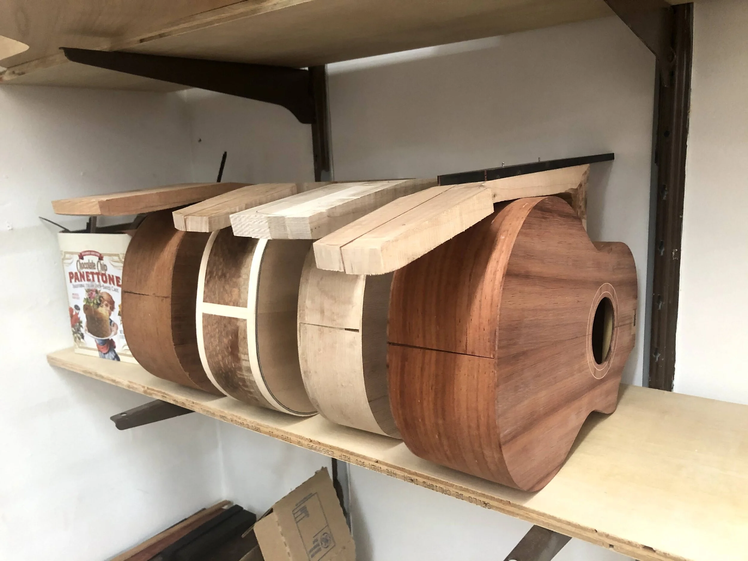 Acoustic guitars drying in shop