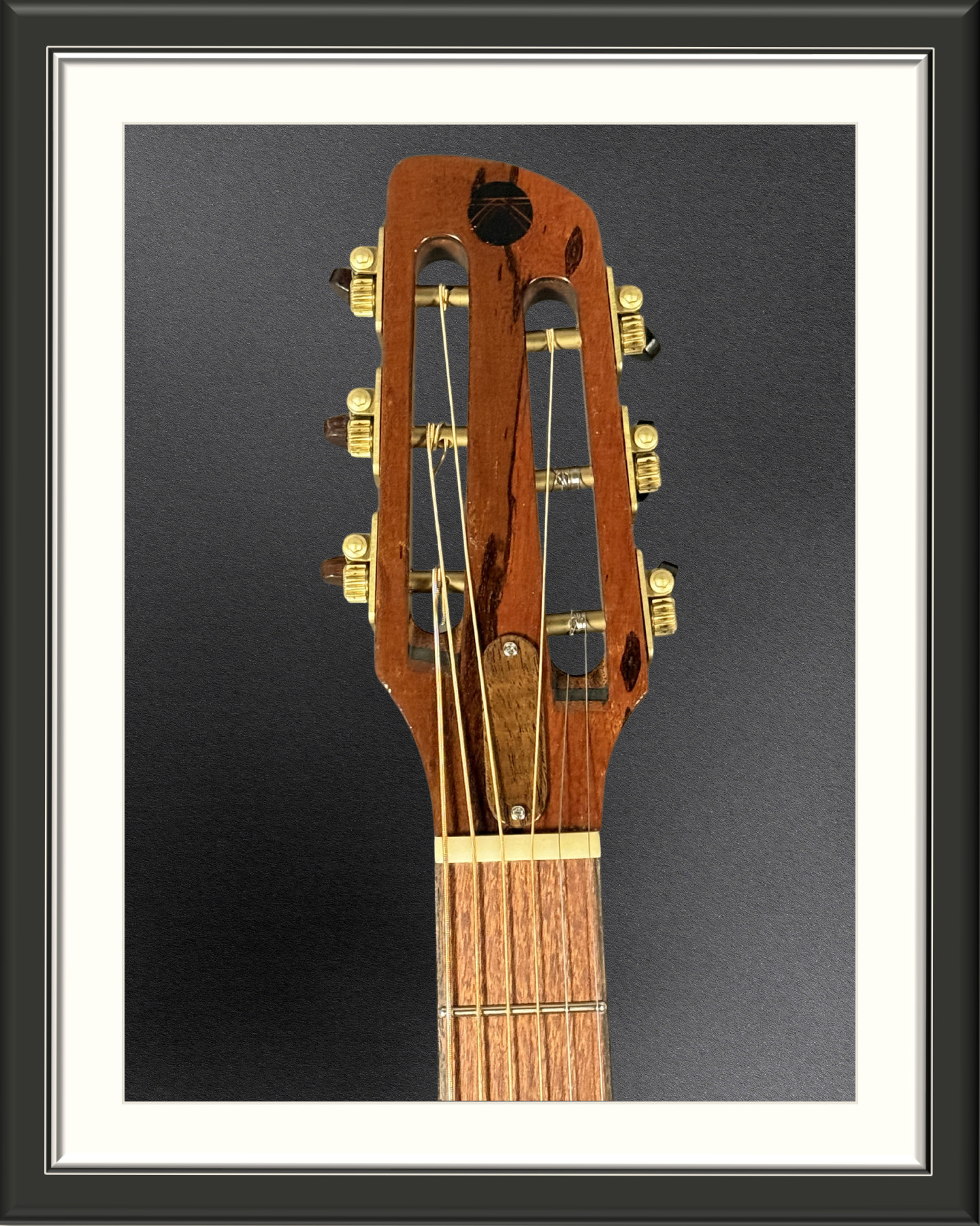 MachMachines Bell Model Acoustic Guitar in Redwood & Black Limba_headstock front