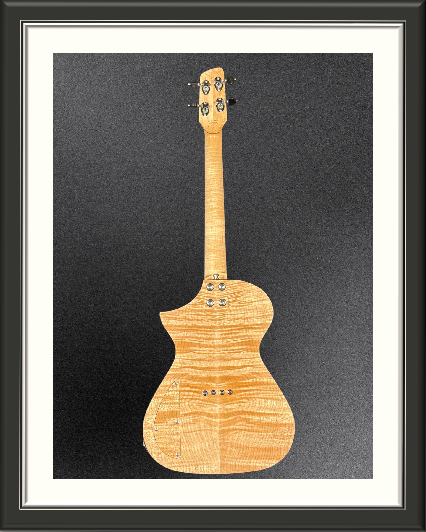 Back of the MachMachines Cuyler Model all-maple, hollow-body, electric baritone ukulele