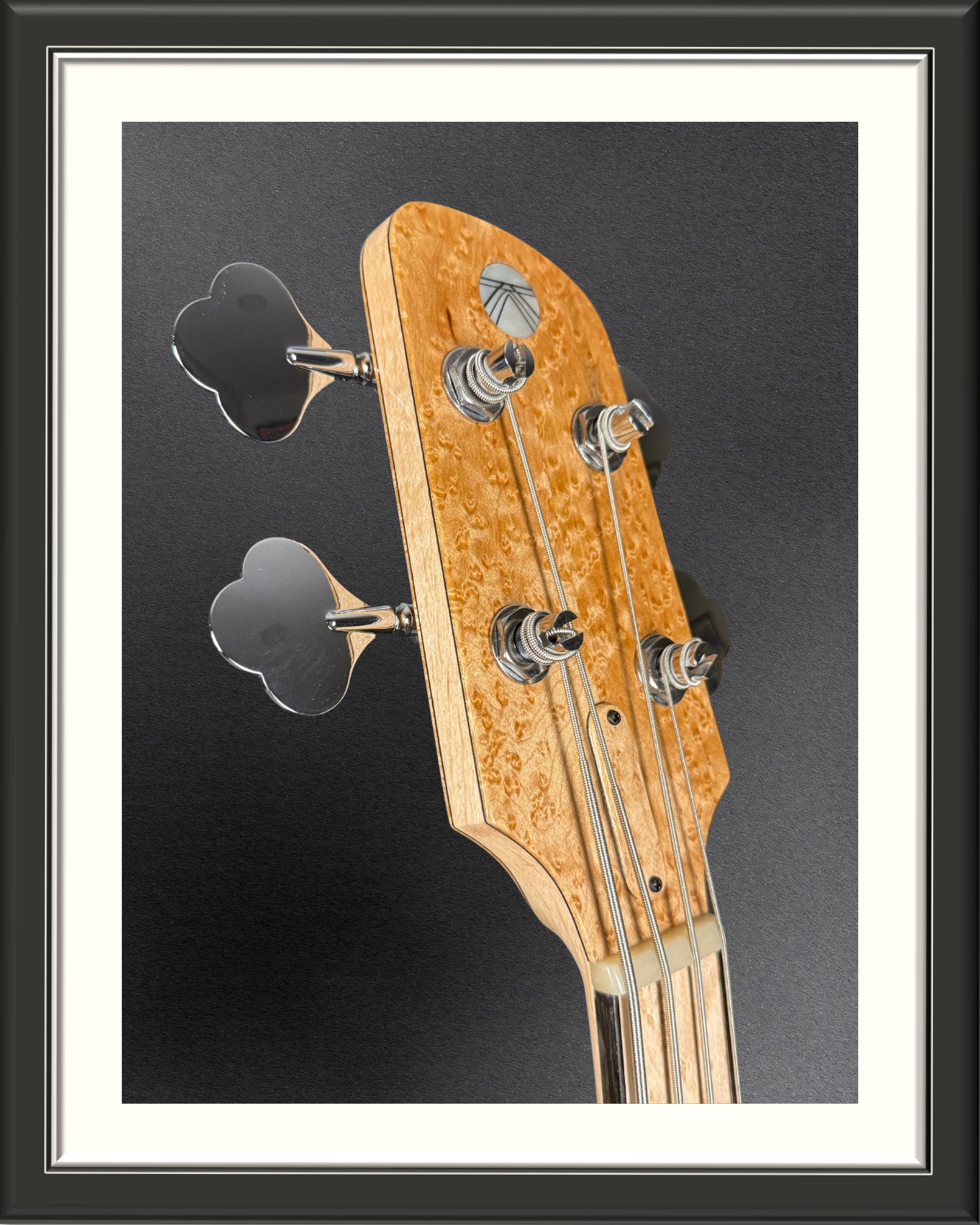 BassElectric_Cuyler_headstockfrontangle.png