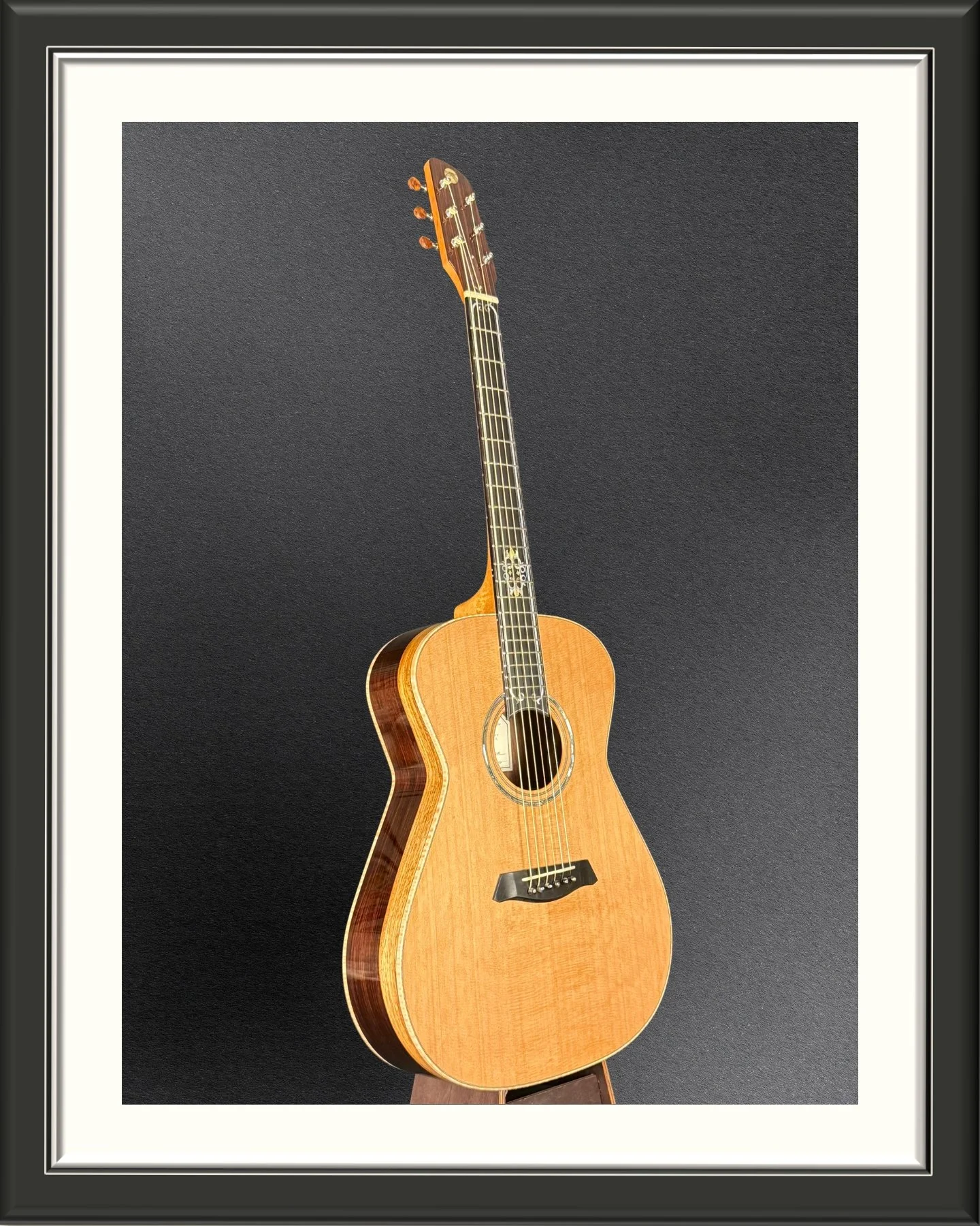 Full image of the ECA custom acoustic guitar with Western Red Cedar top, facing to the right