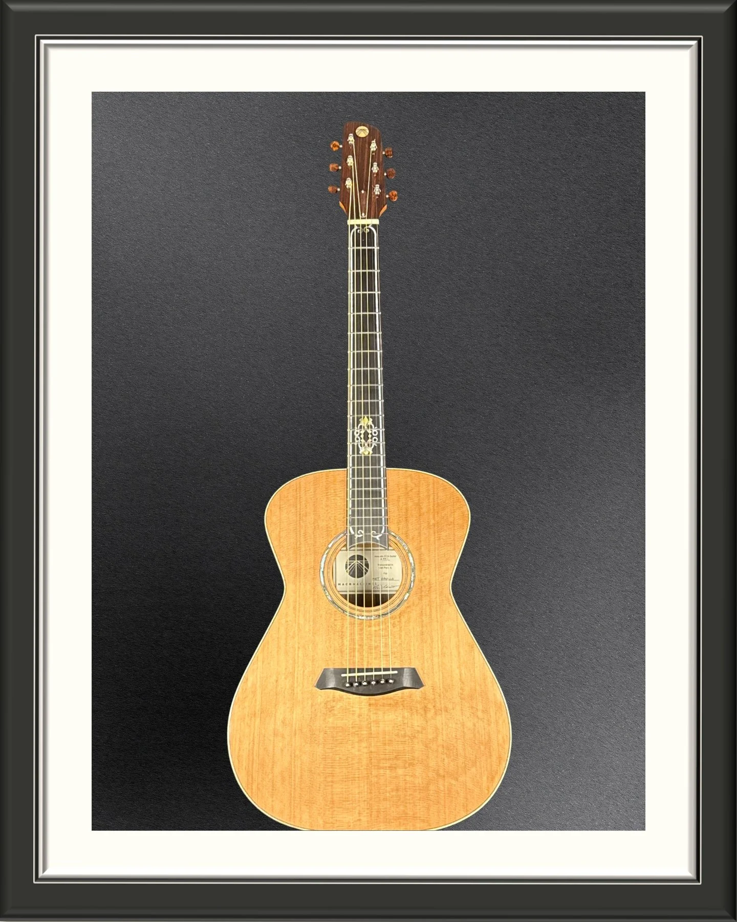 Image of the full front of the ECA custom acoustic guitar with a Western Cedar top